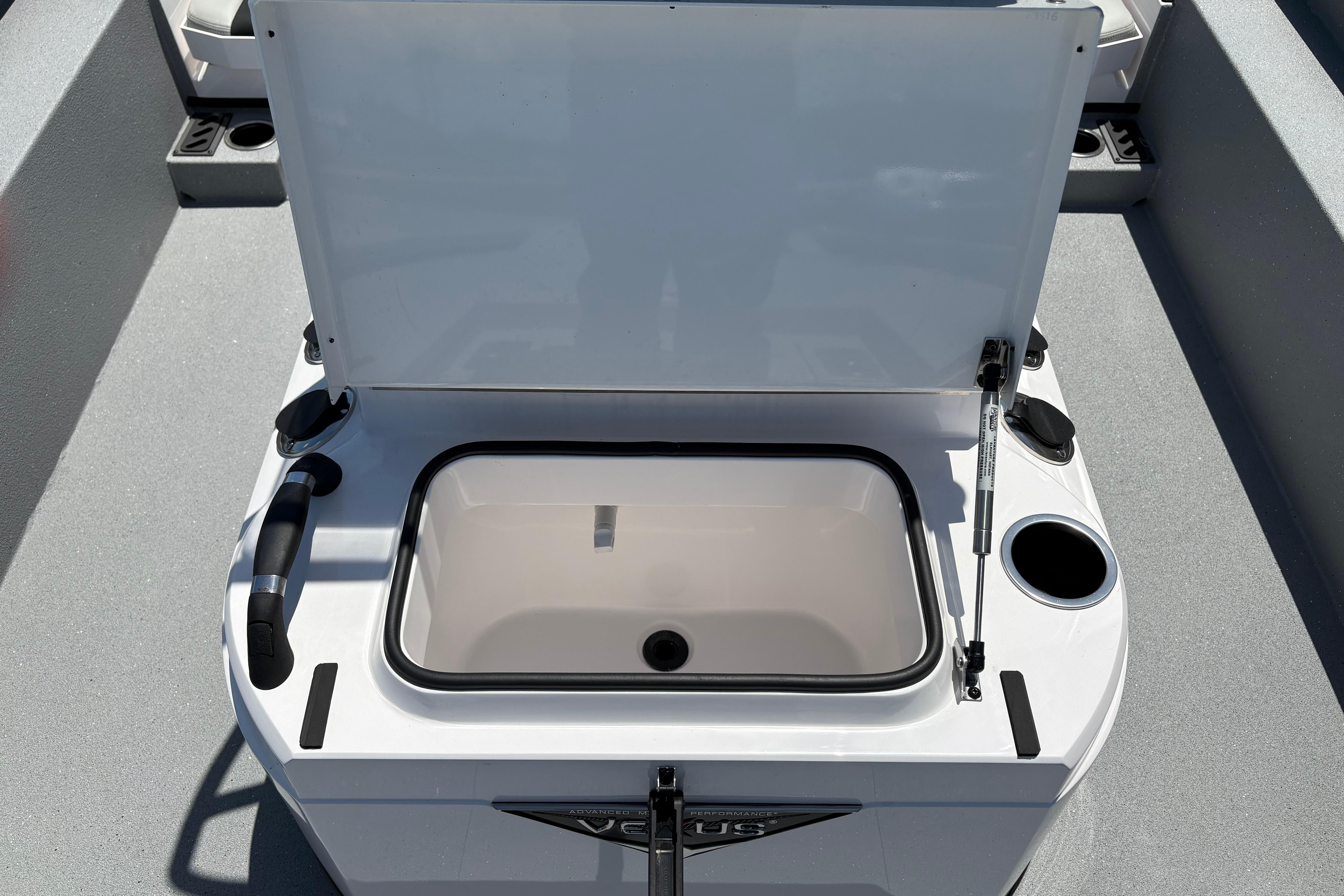 2026 Vexus ACX 2150 boat livewell with open lid, showcasing interior features.