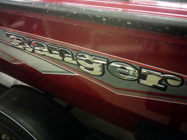2025 Ranger VS1665 SC boat with red and silver detailing.