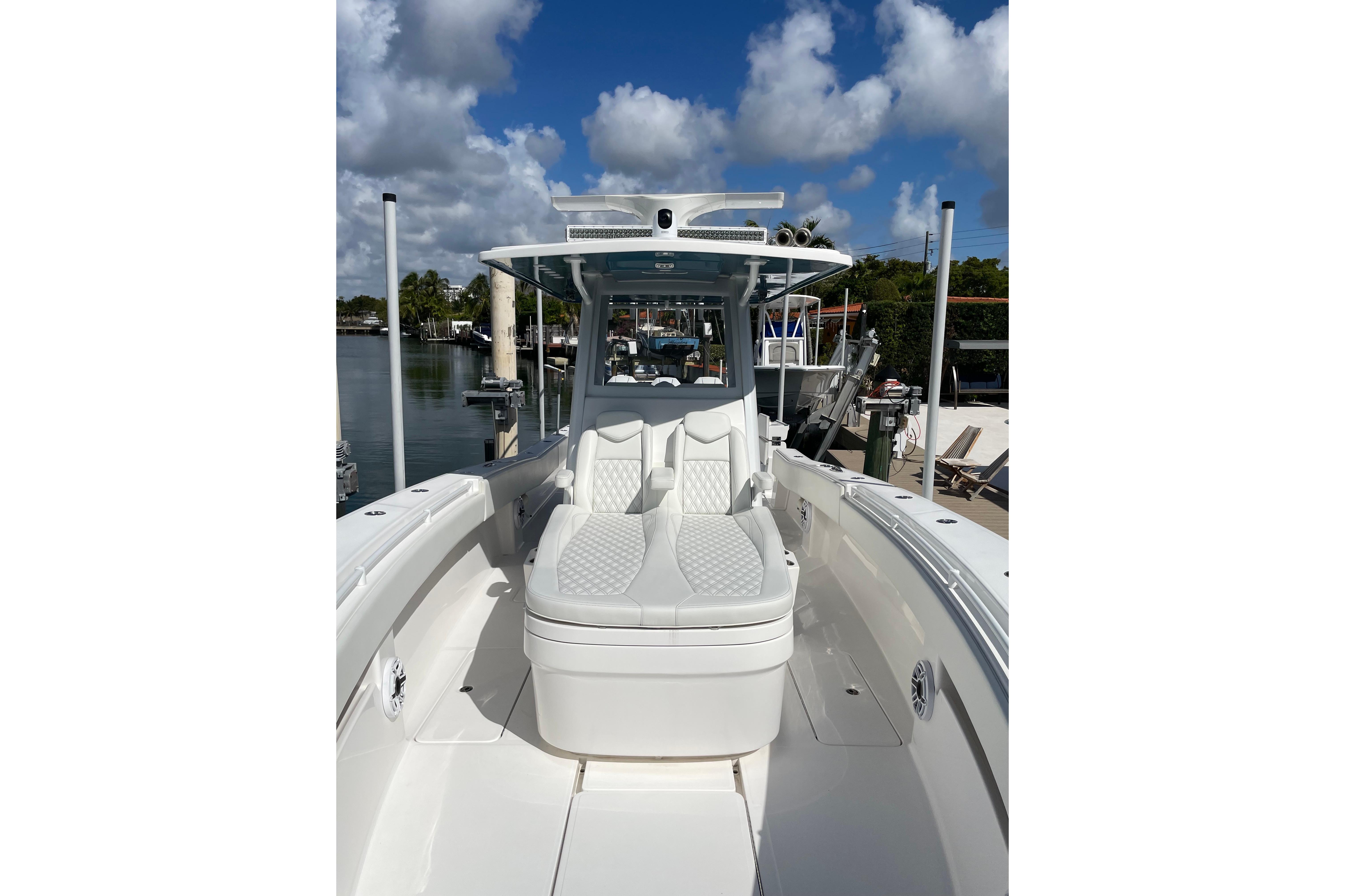 2024 Invincible 36 Open Fisherman boat with sleek seating and modern design.