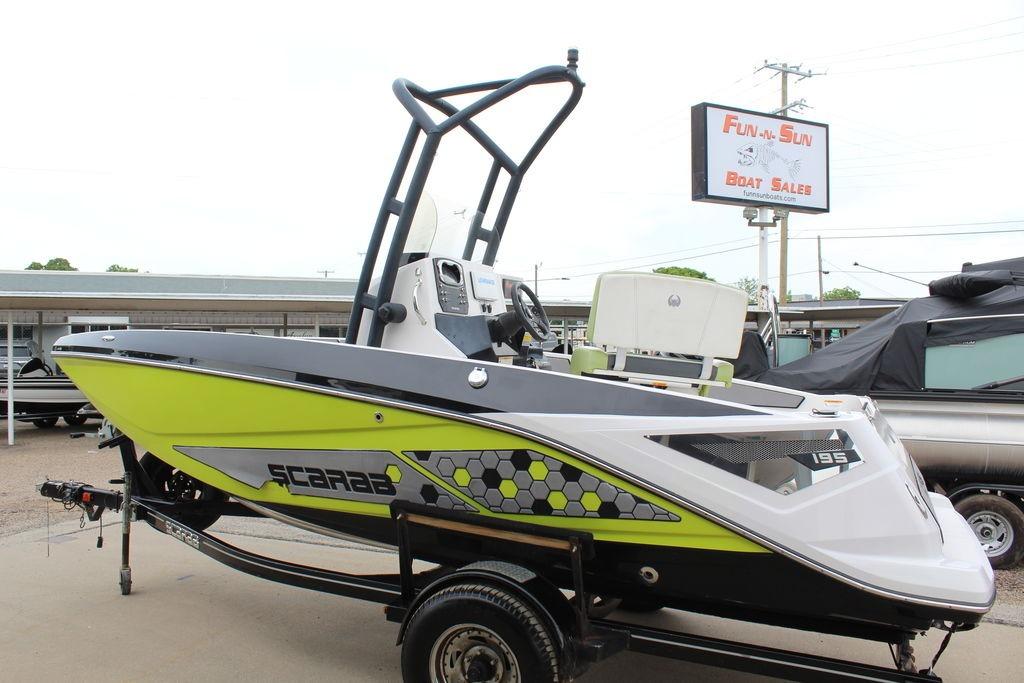 2017 Scarab 195 boat in vibrant lime green at Fun N Sun Boat Sales.