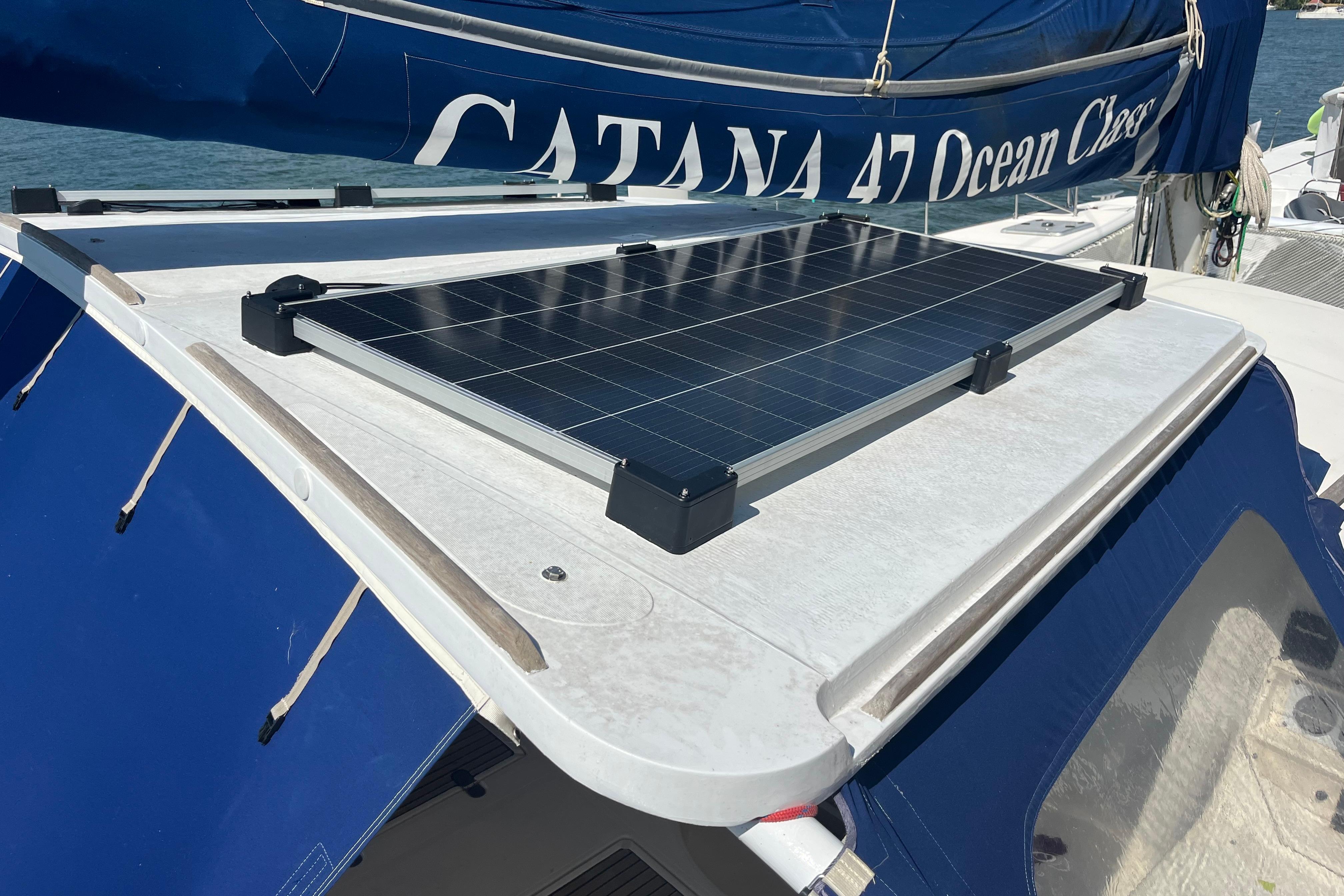2004 Catana 471 Ocean Class sailboat with solar panel on deck.