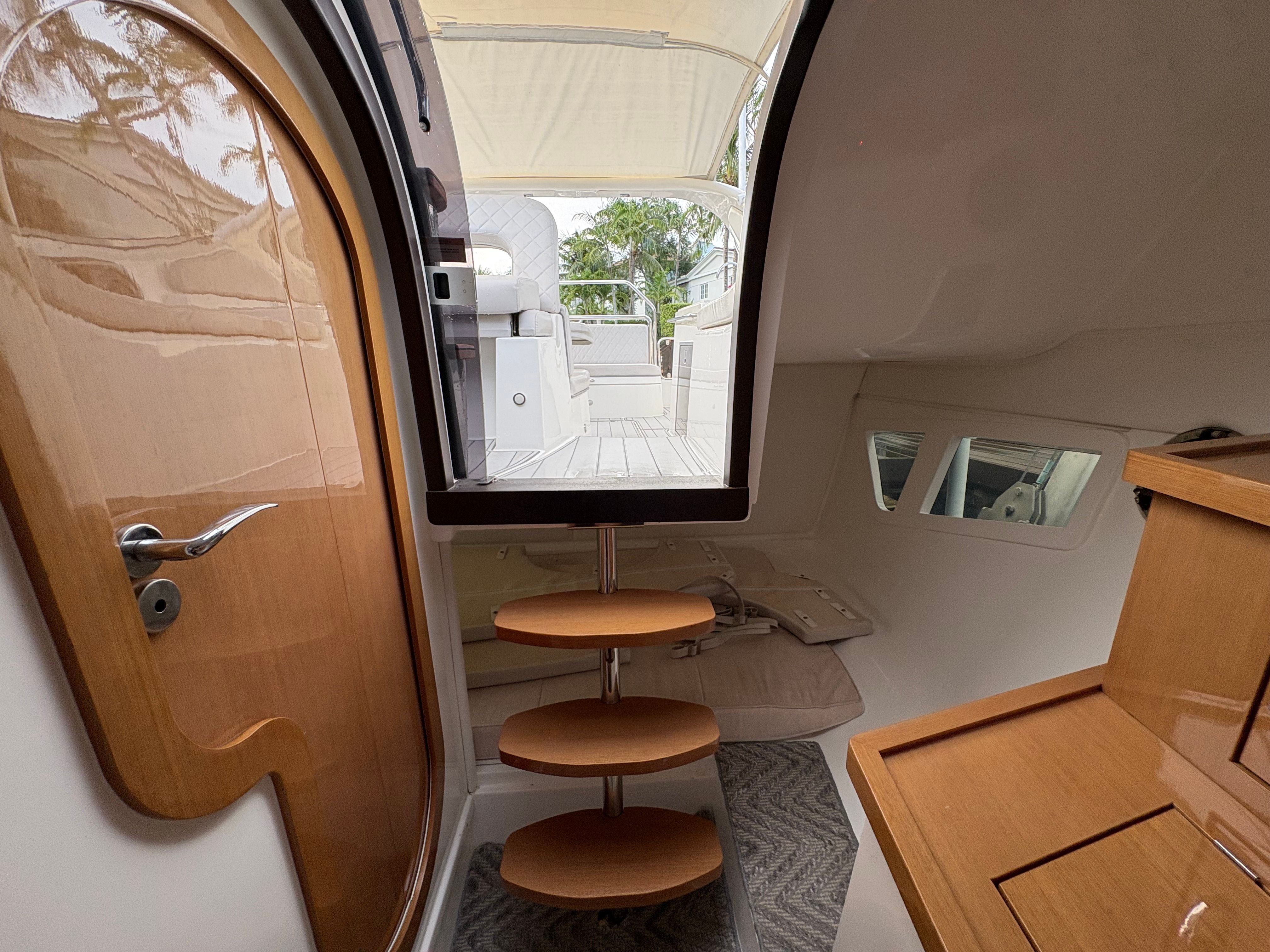 Interior of the 2023 Schaefer 303 Sport with wooden doors and stairs.