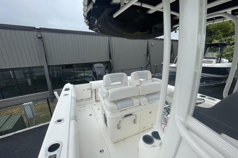 2012 Boston Whaler 250 Outrage boat interior with seating and storage features.