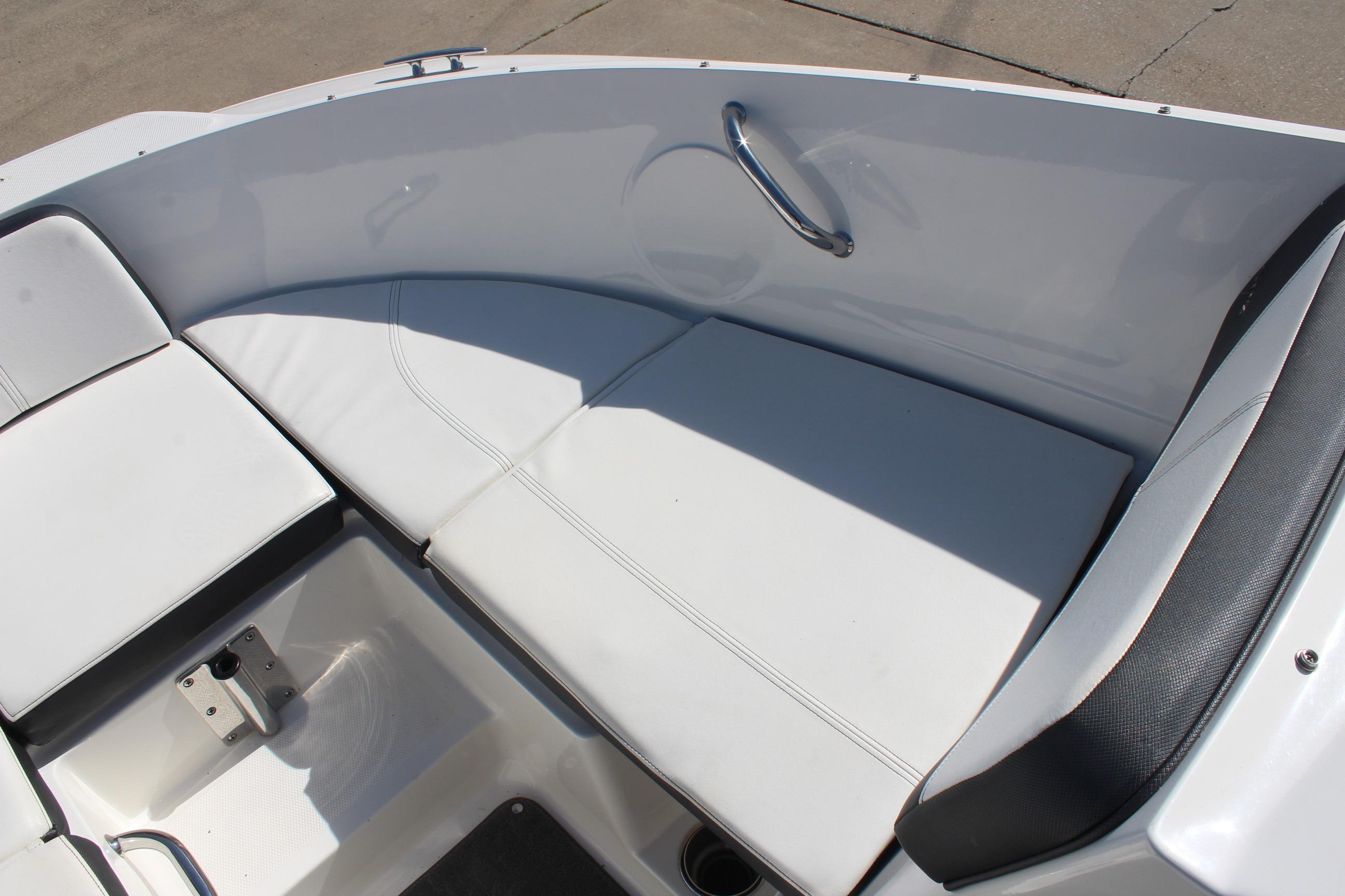 2015 Sea Ray 19 SPX OB boat interior with white cushioned seating.
