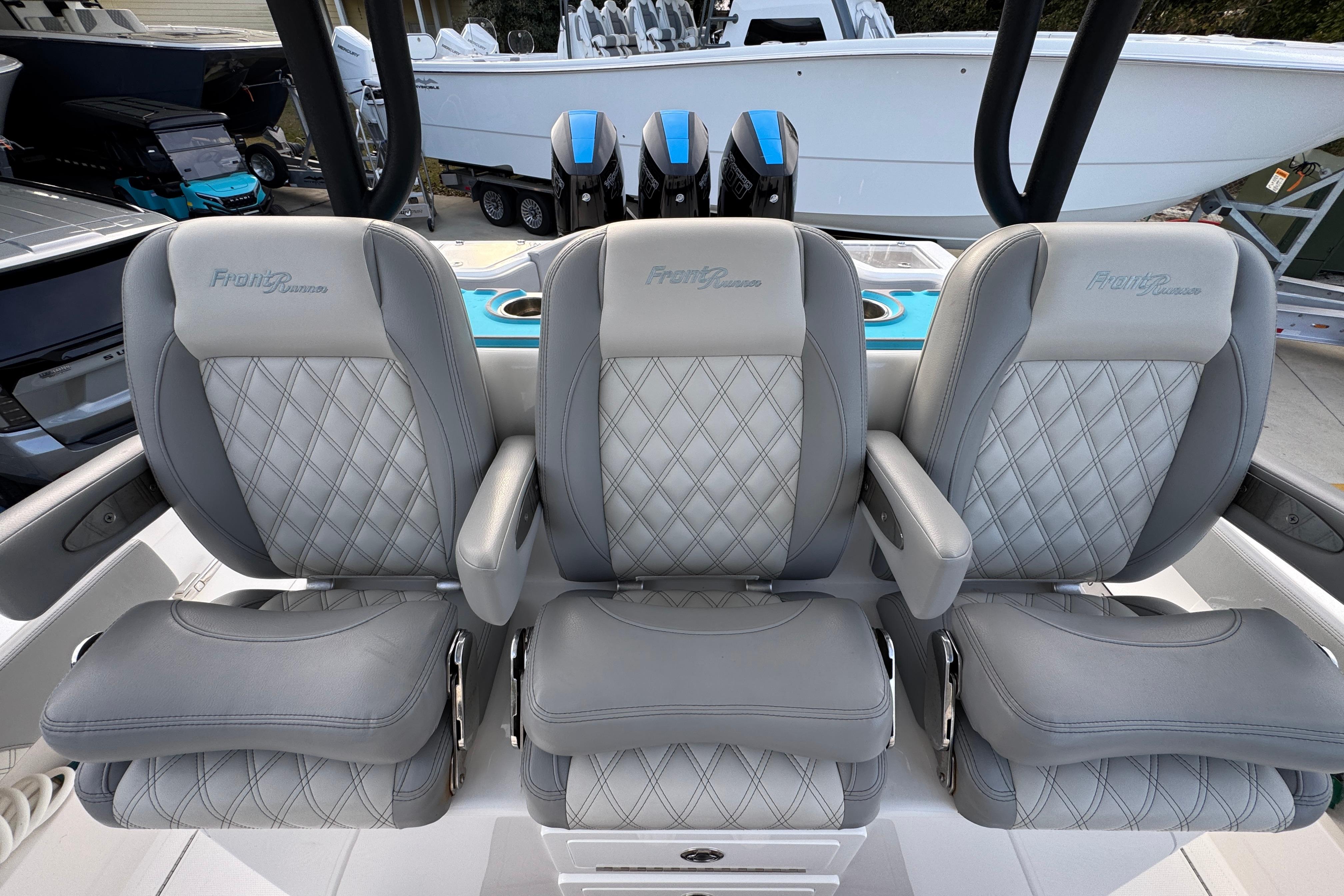 Luxurious seating on 2023 Front Runner 36 Center Console boat with diamond-stitched upholstery.