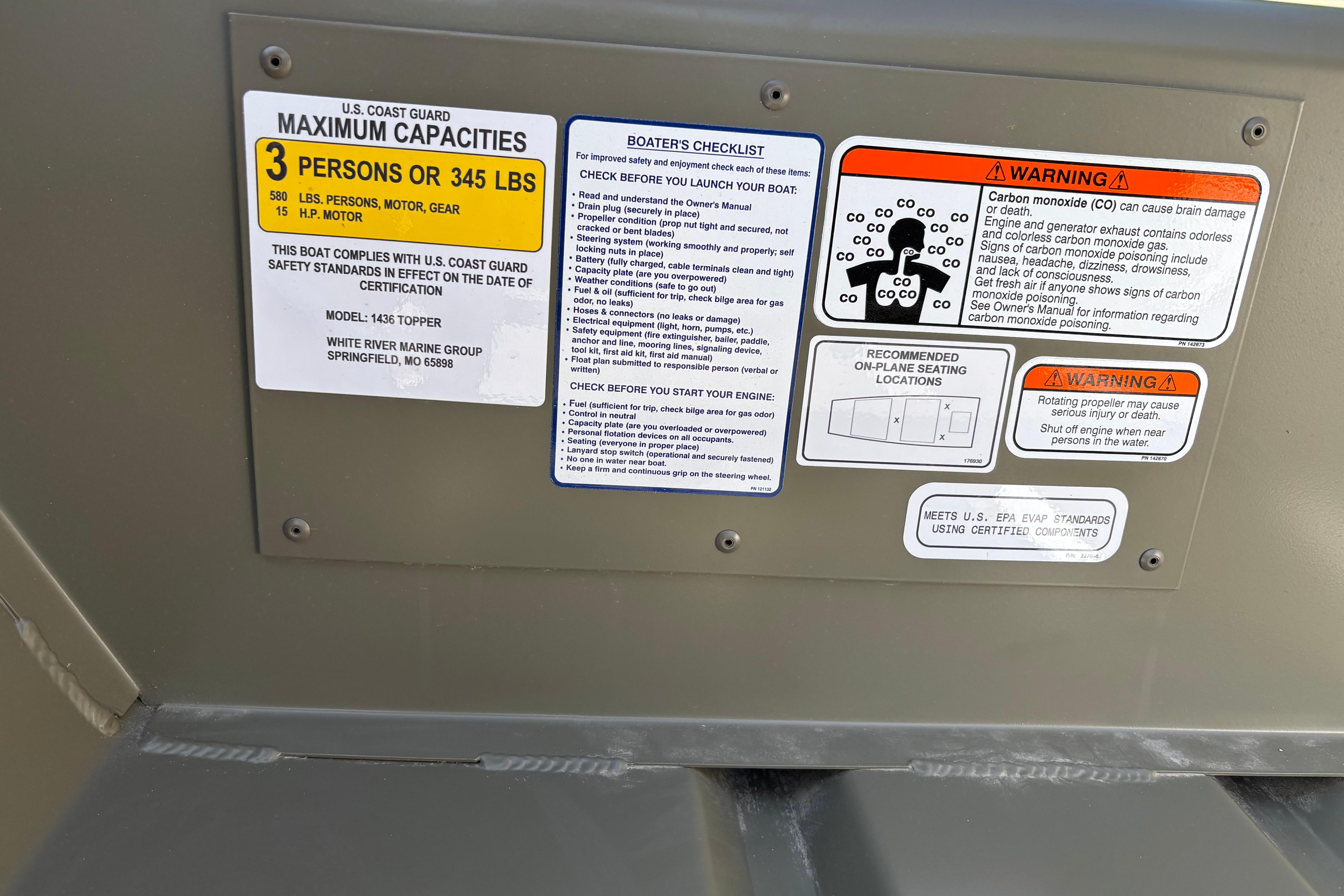 Safety and capacity labels on 2026 Tracker Grizzly 14 Jon boat.