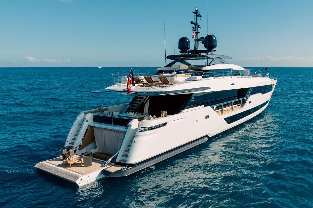 Luxurious 2018 Custom Line 120 yacht cruising on open sea.
