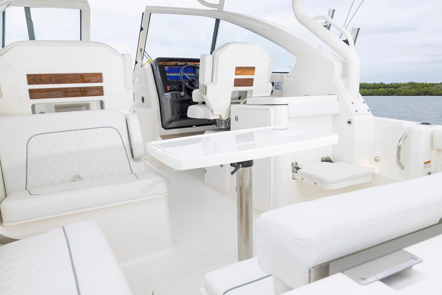 Manufacturer Provided Image: 2026 Pursuit DC 286 Dual Console interior with white seating and sleek design.