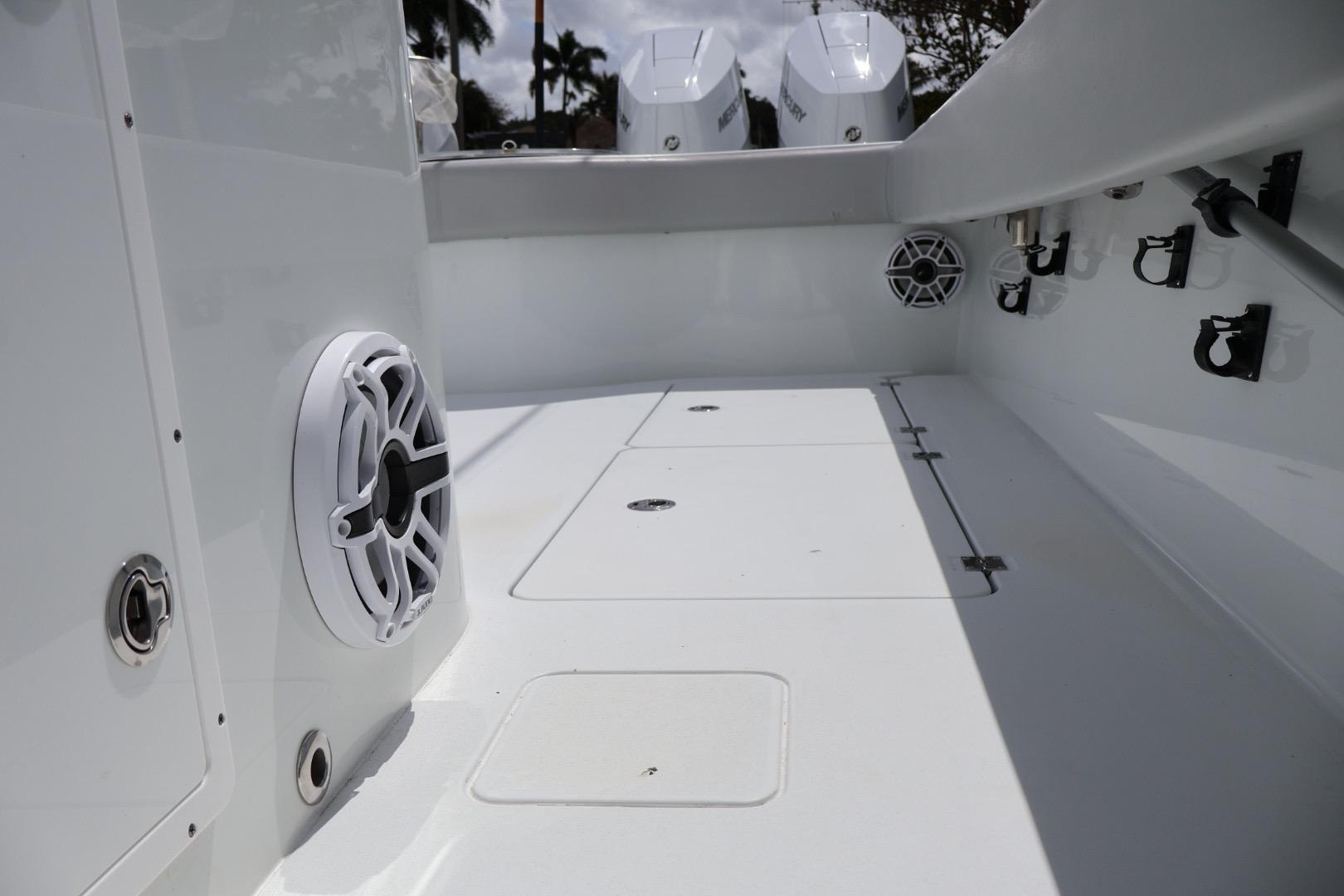 Freeman 42LR 2021 boat interior with speakers and storage compartments.
