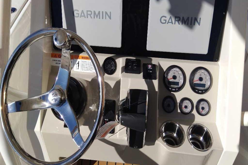 2026 Ranger 2510 Bay boat dashboard with Garmin displays and steering wheel.