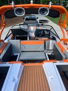 2014 Nautique Super Air G21 boat with orange interior.