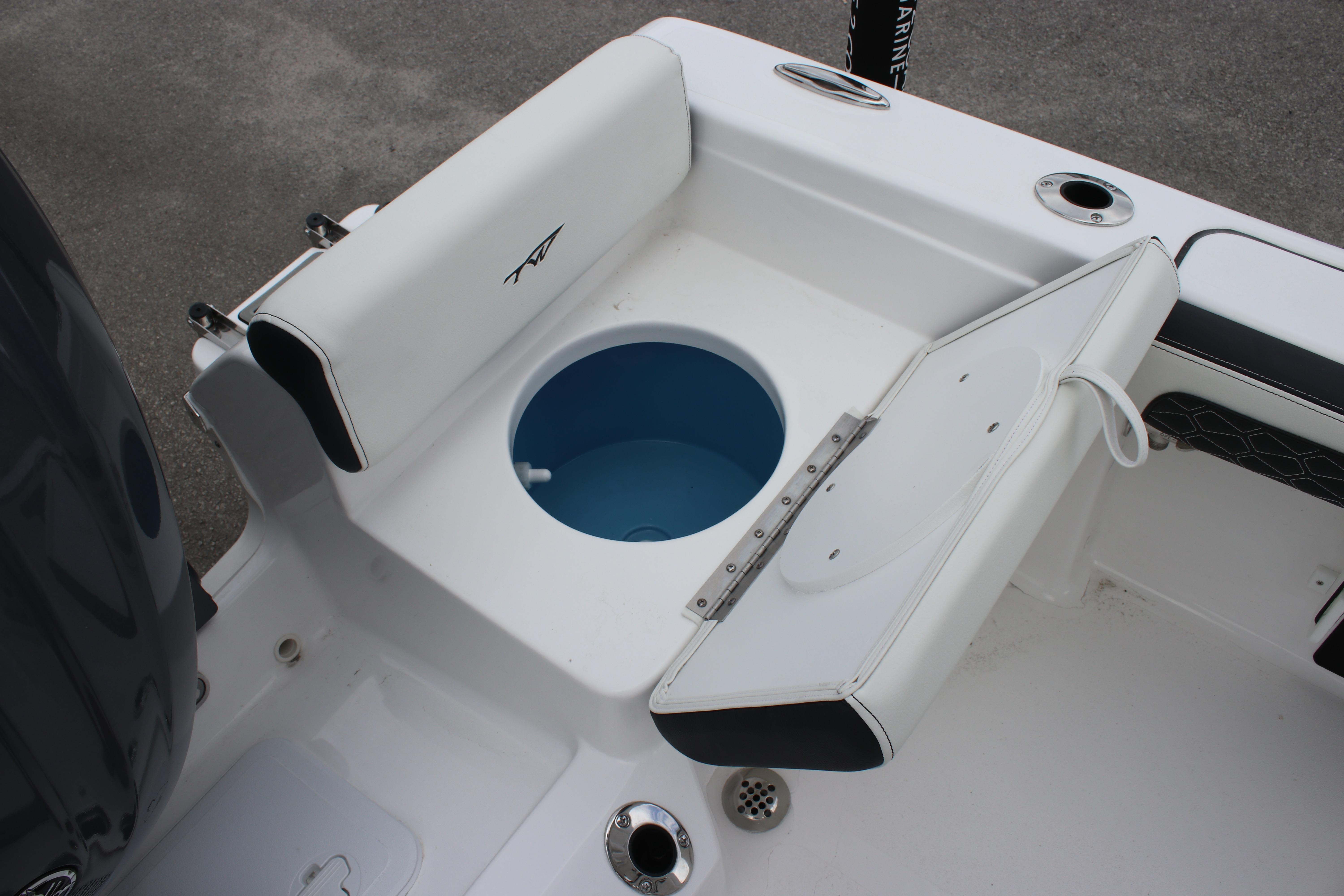 2026 Tidewater 198 CC Adventure boat with open storage compartment and seating.