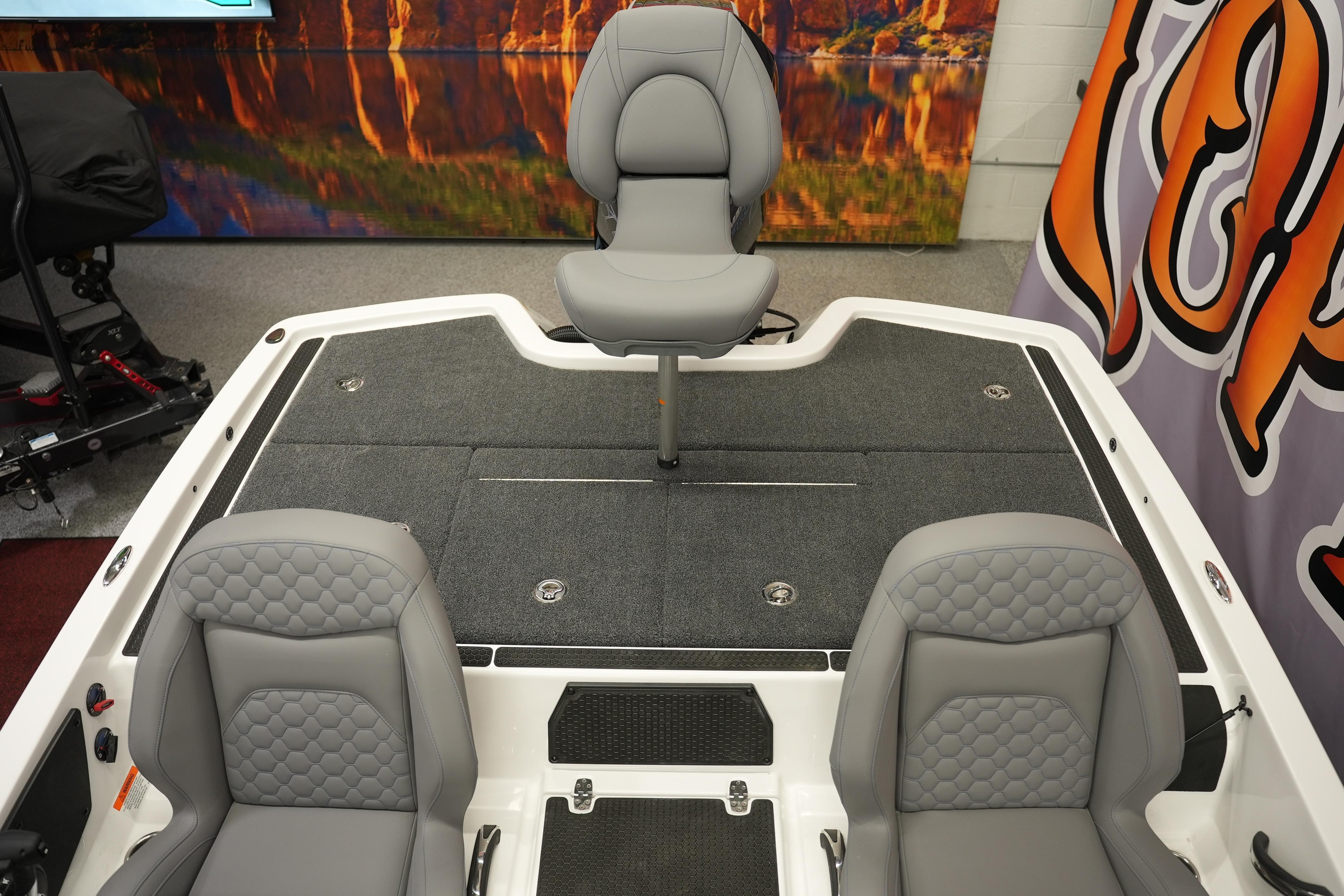 2026 iKon VLE21 boat interior with gray seating and carpeted deck.