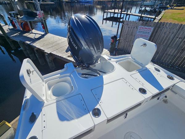 2026 Sea Hunt BX 22 BR boat with Yamaha outboard motor at dock.