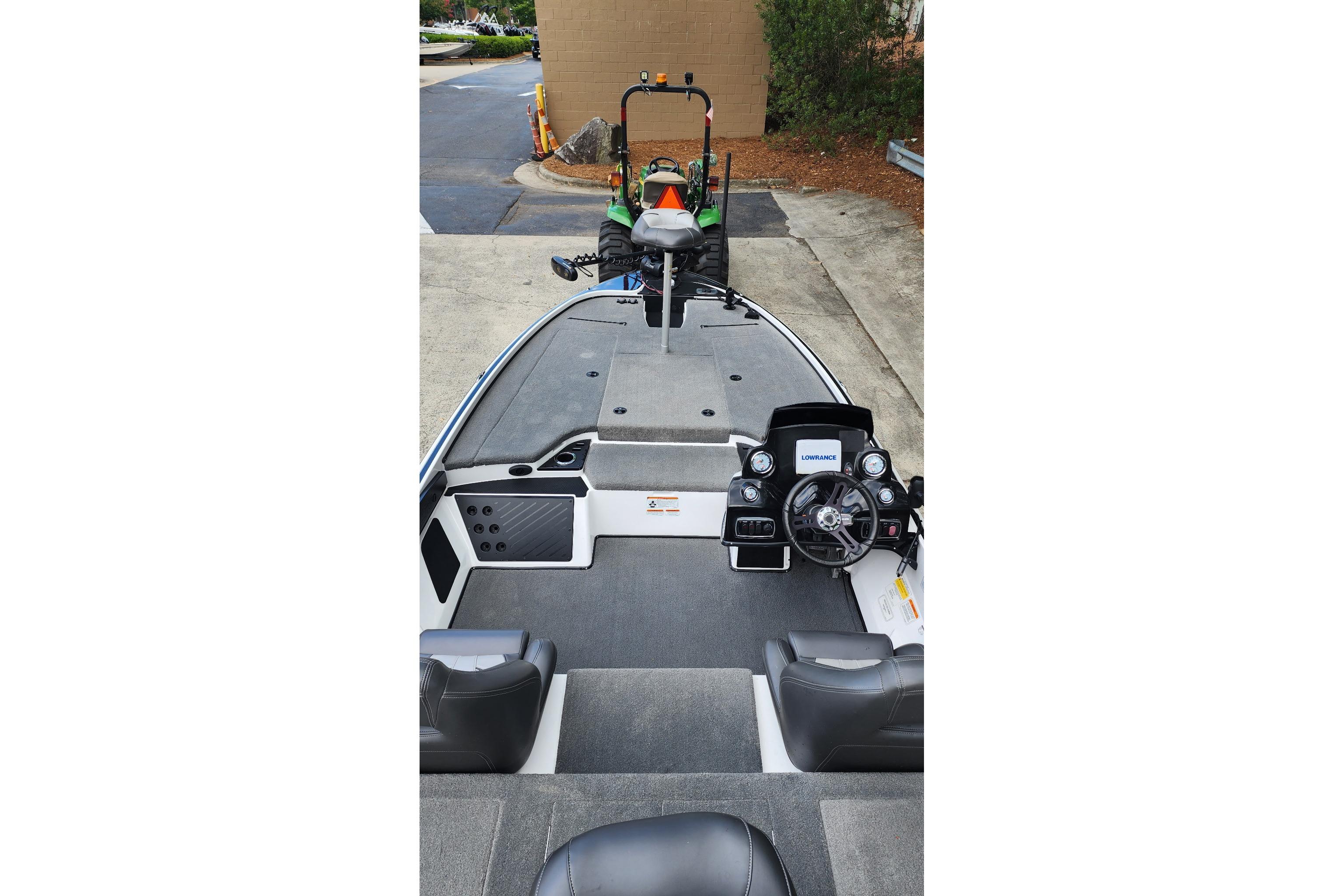 2017 Nitro Z18 boat interior with steering console and seating.