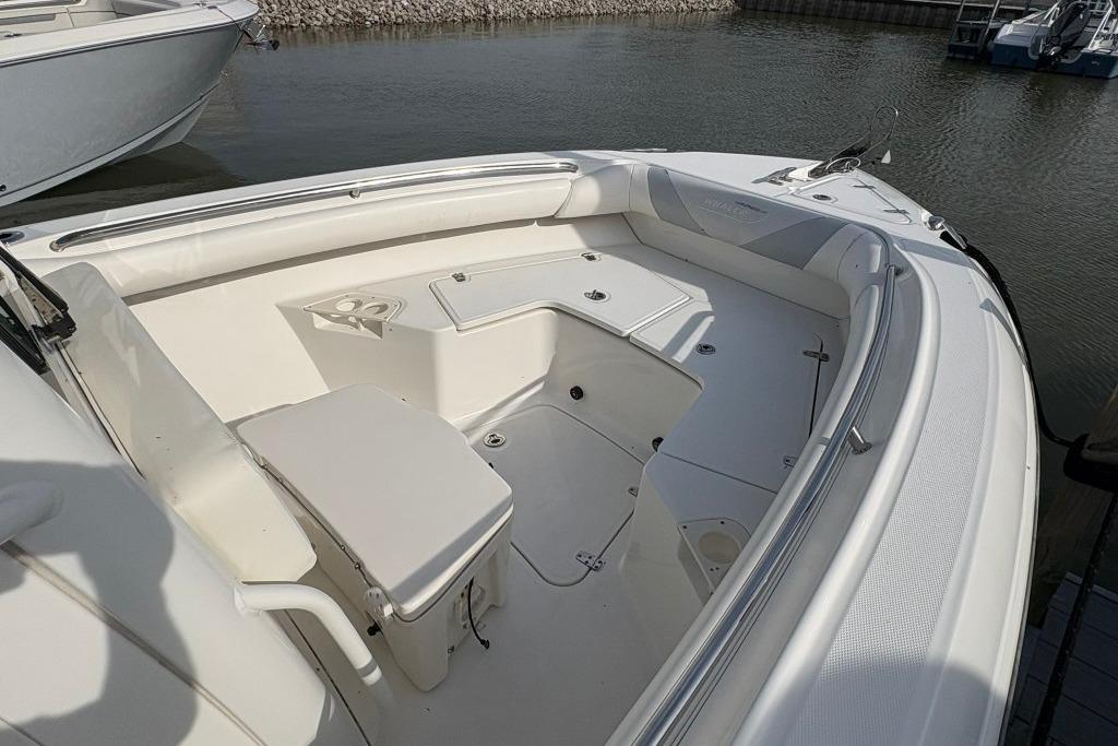 2012 Boston Whaler 250 Outrage boat interior with spacious seating and storage.