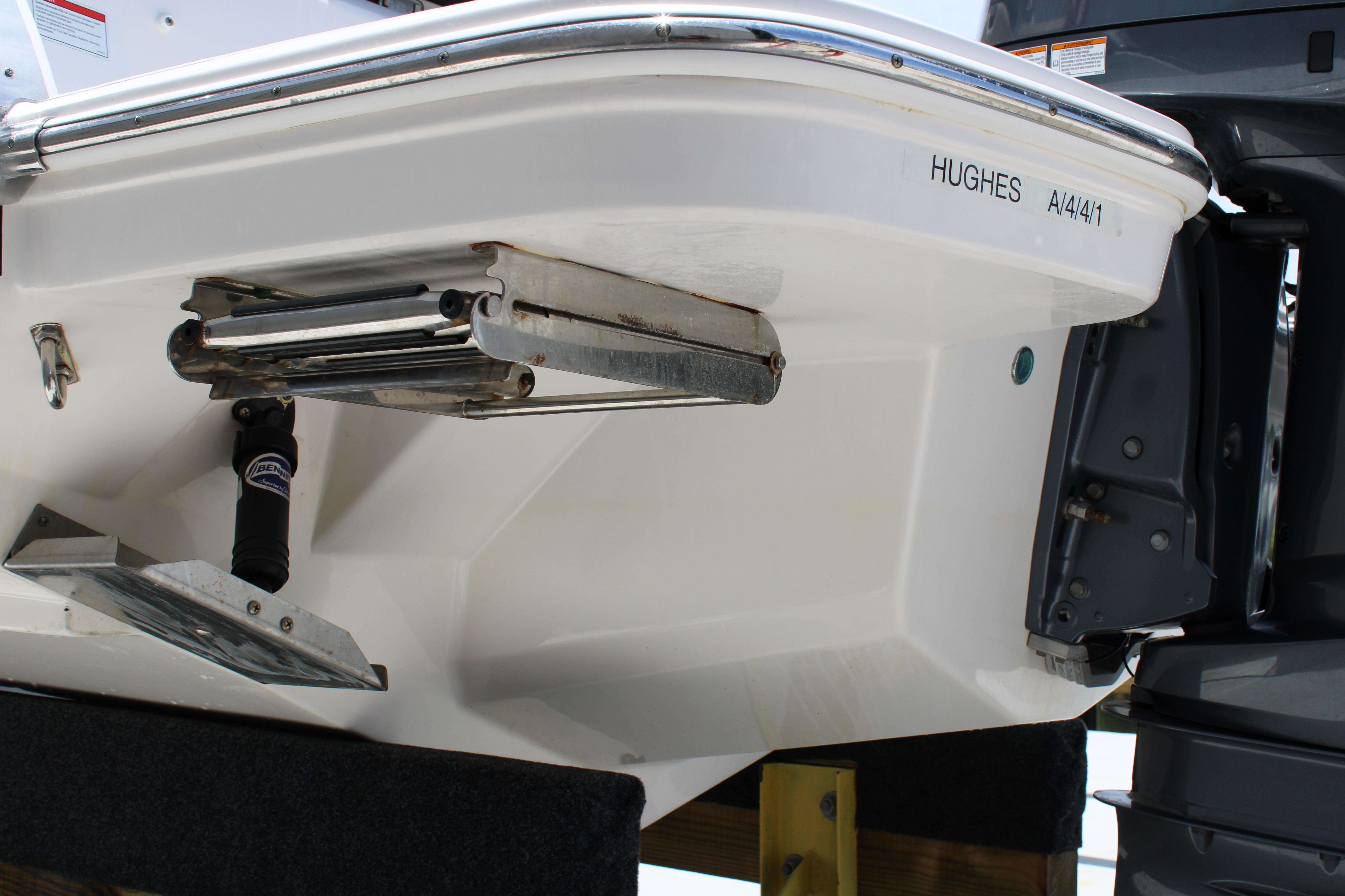 2021 Regal 26 OBX boat stern with ladder and motor detail.