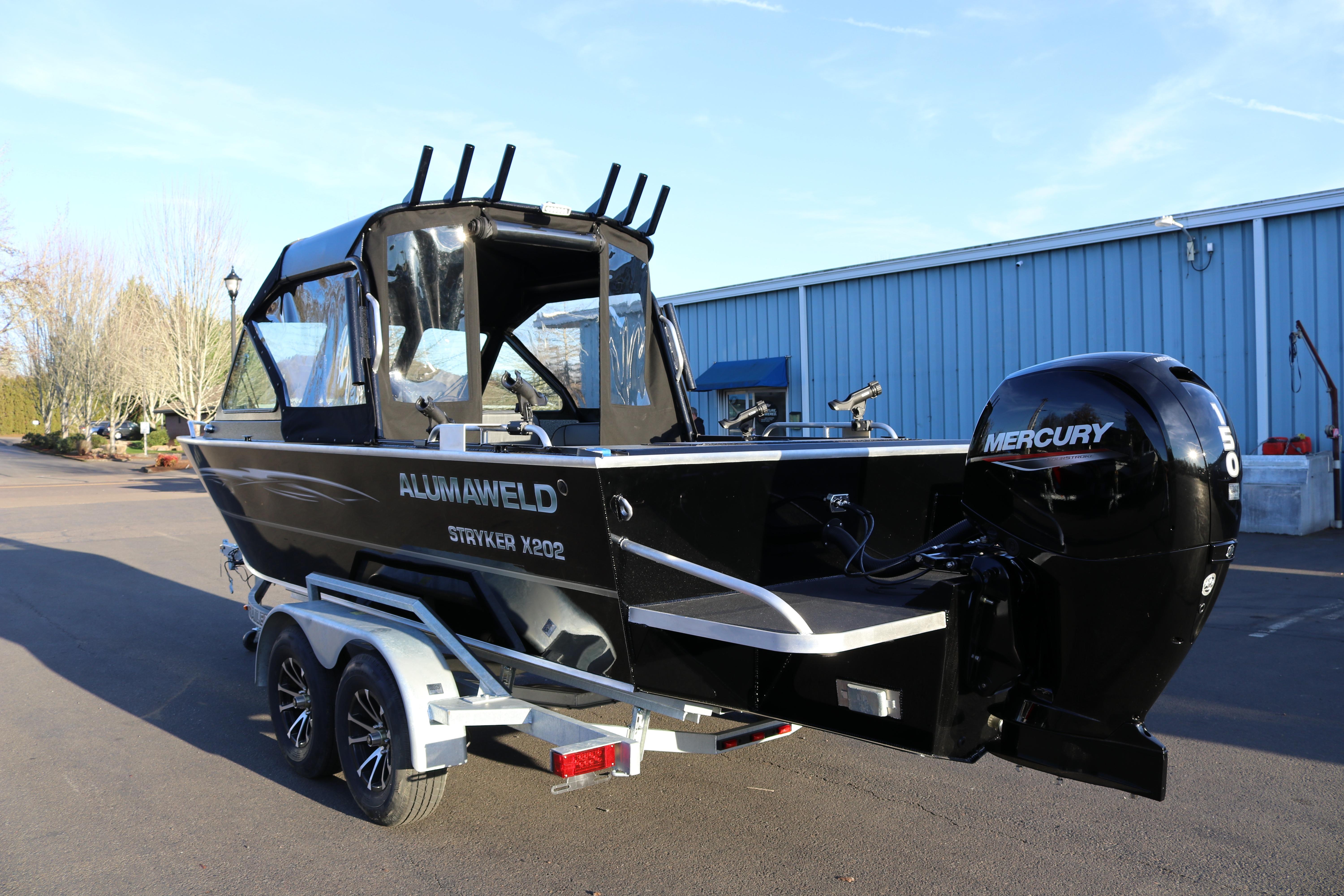 2026 Alumaweld Stryker X202 boat with Mercury engine on trailer.