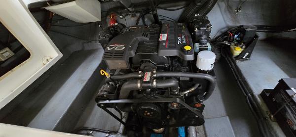 1999 Sea Ray 280 SS engine compartment with V8 motor, showcasing mechanical components.