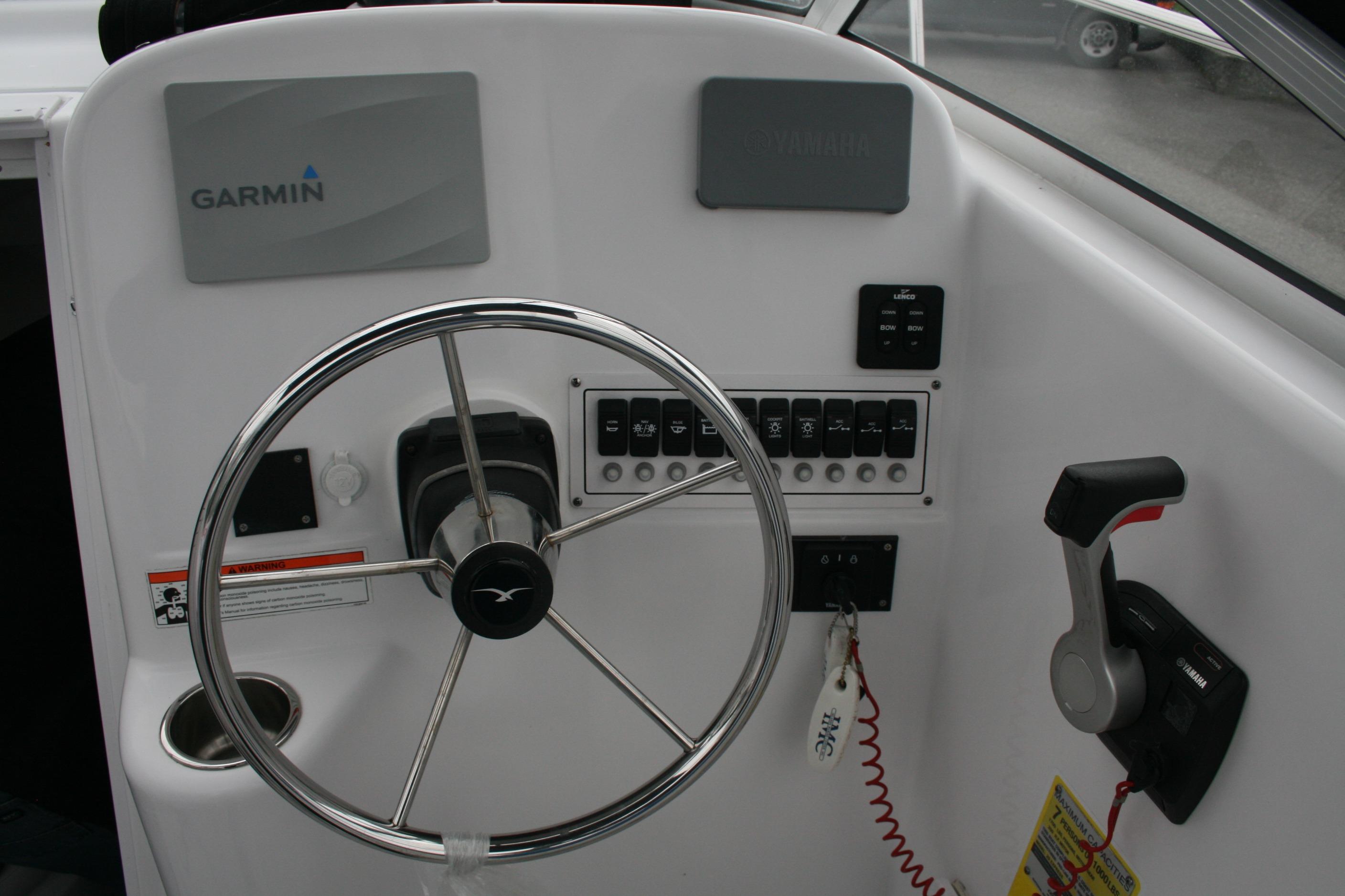 2013 Pro-Line 20 Express boat dashboard with Garmin navigation and Yamaha controls.