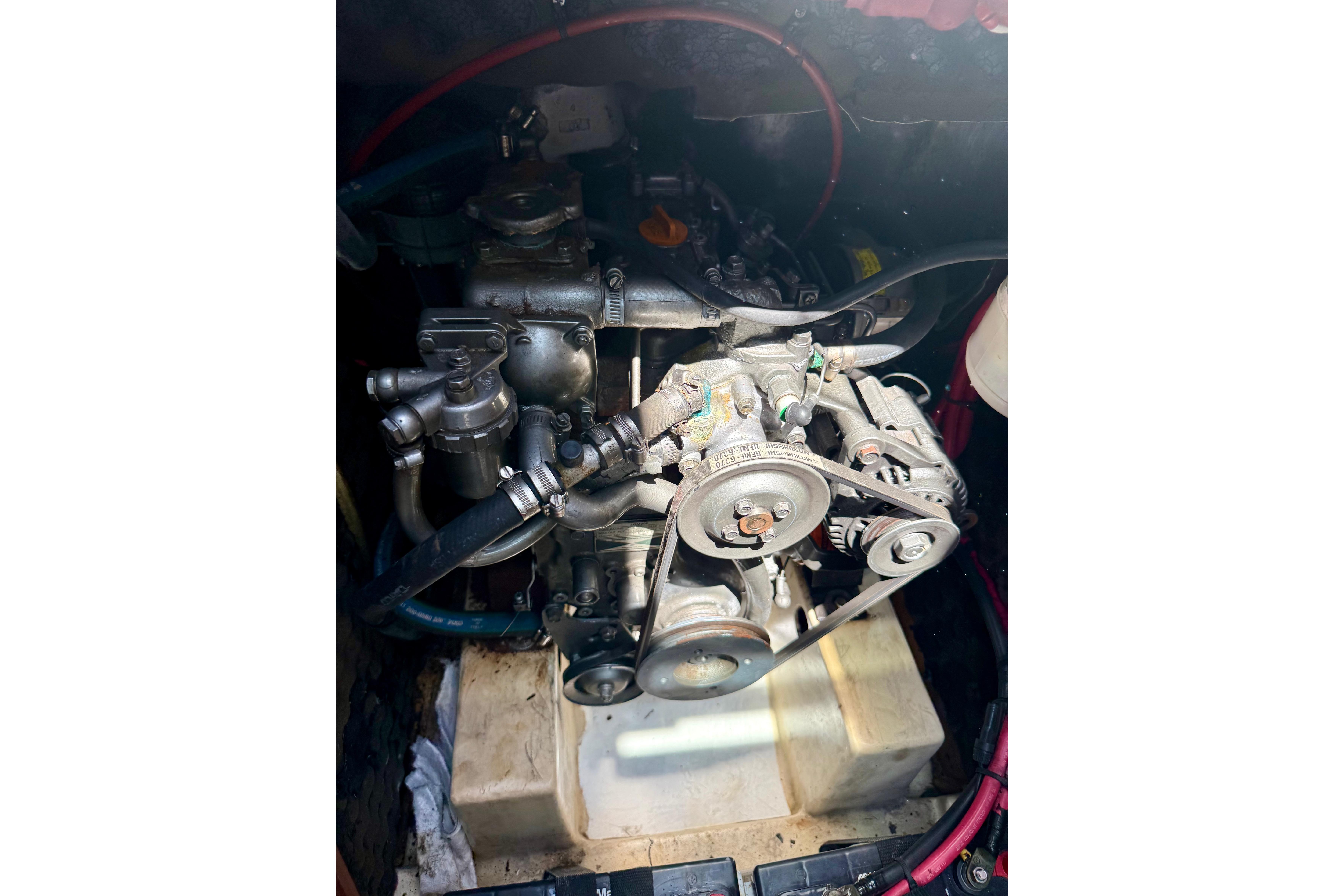 Engine compartment of a 2002 Beneteau Oceanis Clipper 311 sailboat.