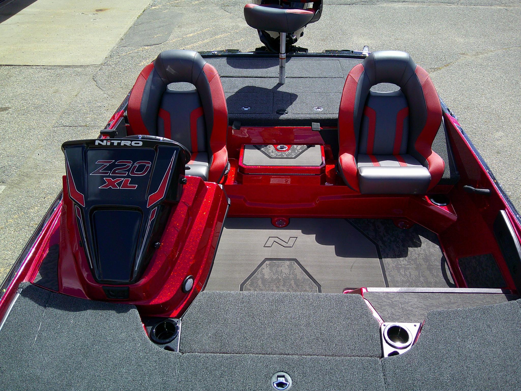 2025 Nitro Z20 XL boat interior with red and gray seating, sleek design.