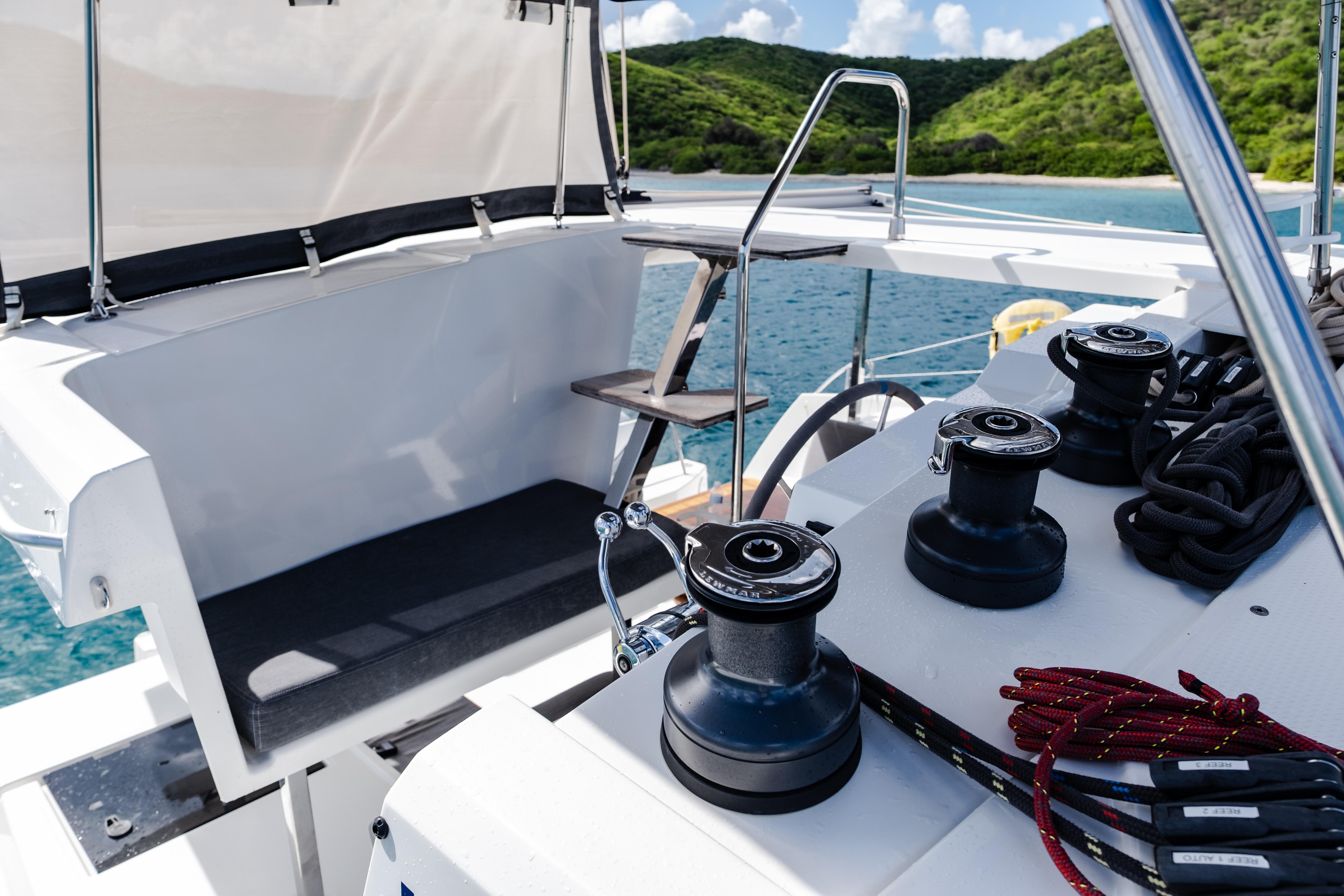 Cockpit view of 2023 Fountaine Pajot Isla 40 catamaran with winches and ropes.