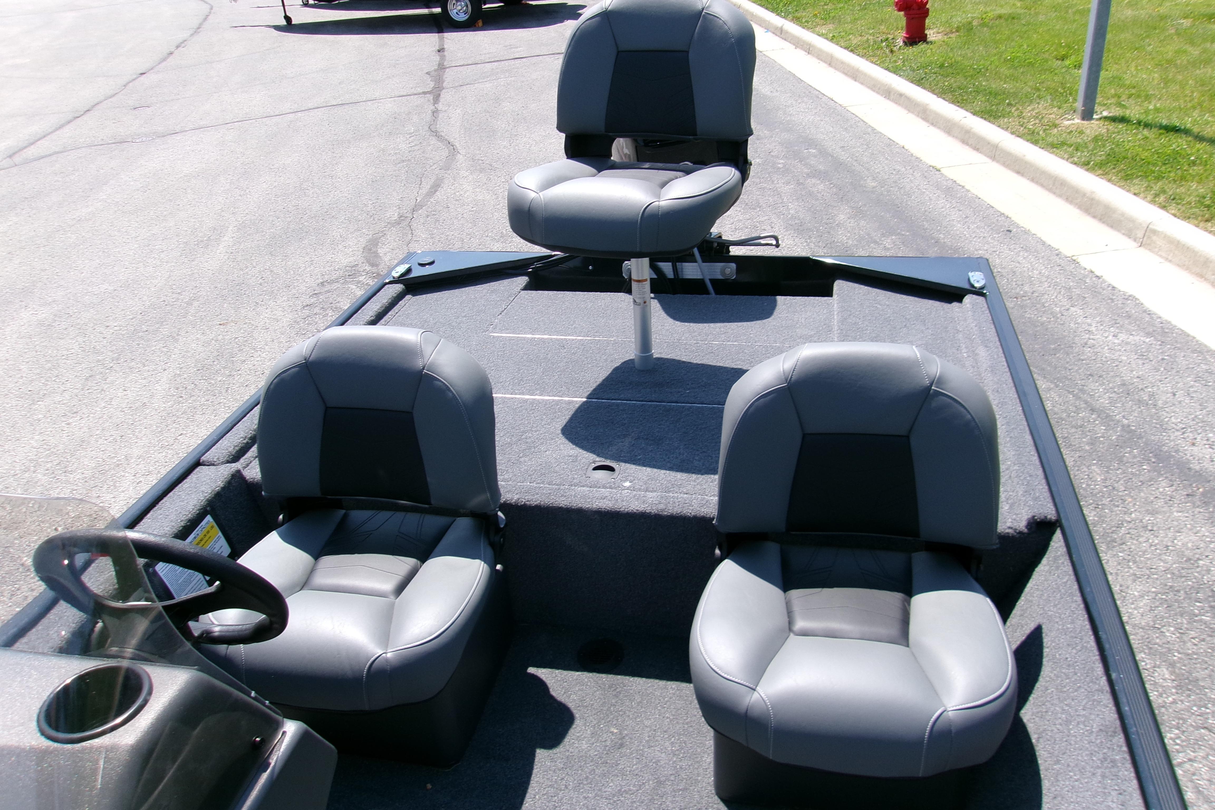 2026 Tracker Bass Tracker Classic XL boat interior with three gray seats.