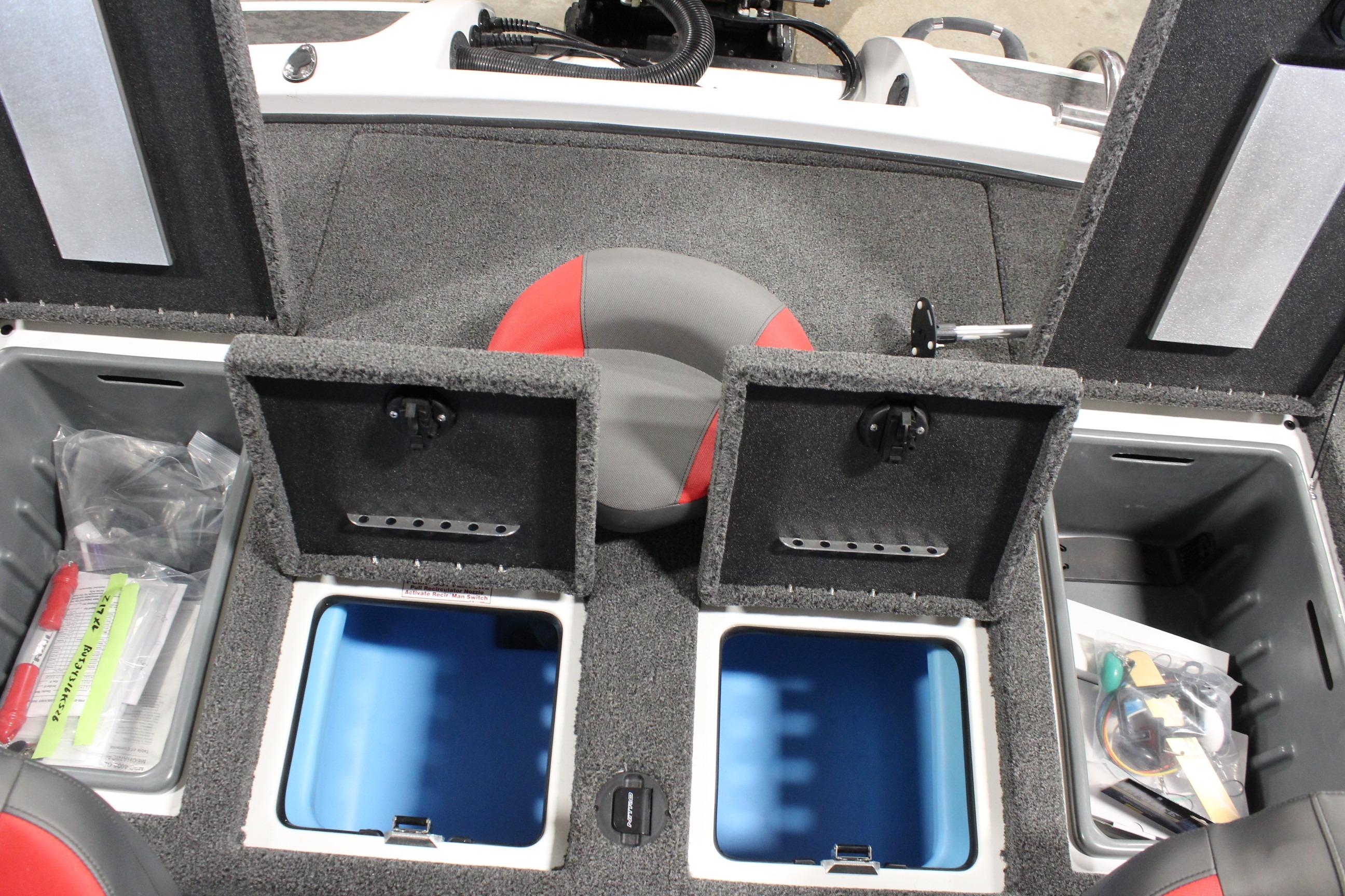 Interior of 2026 Nitro Z19 XL Pro boat with storage compartments and seating.