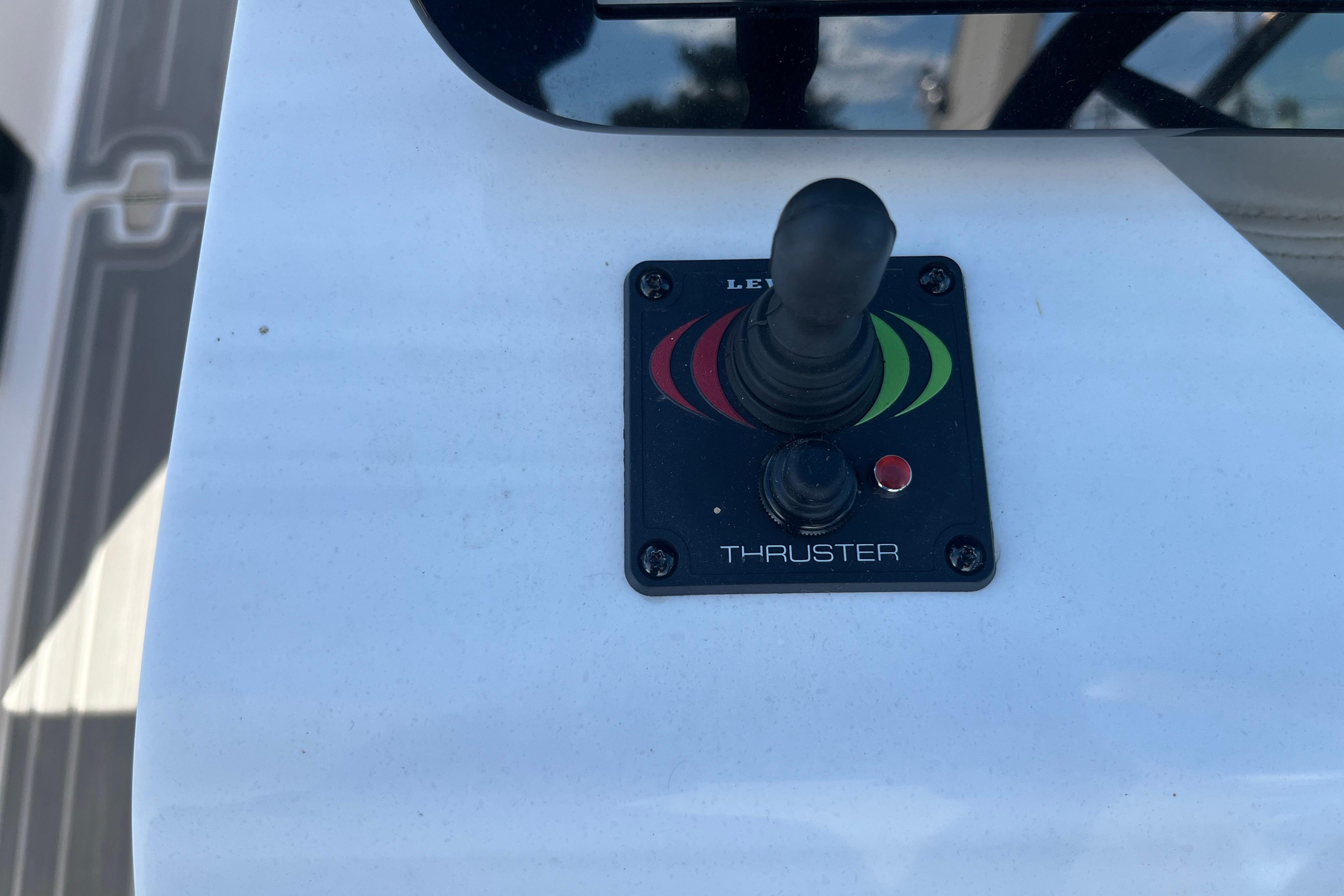 2024 Regal LS9 Surf thruster control panel with joystick on boat deck.