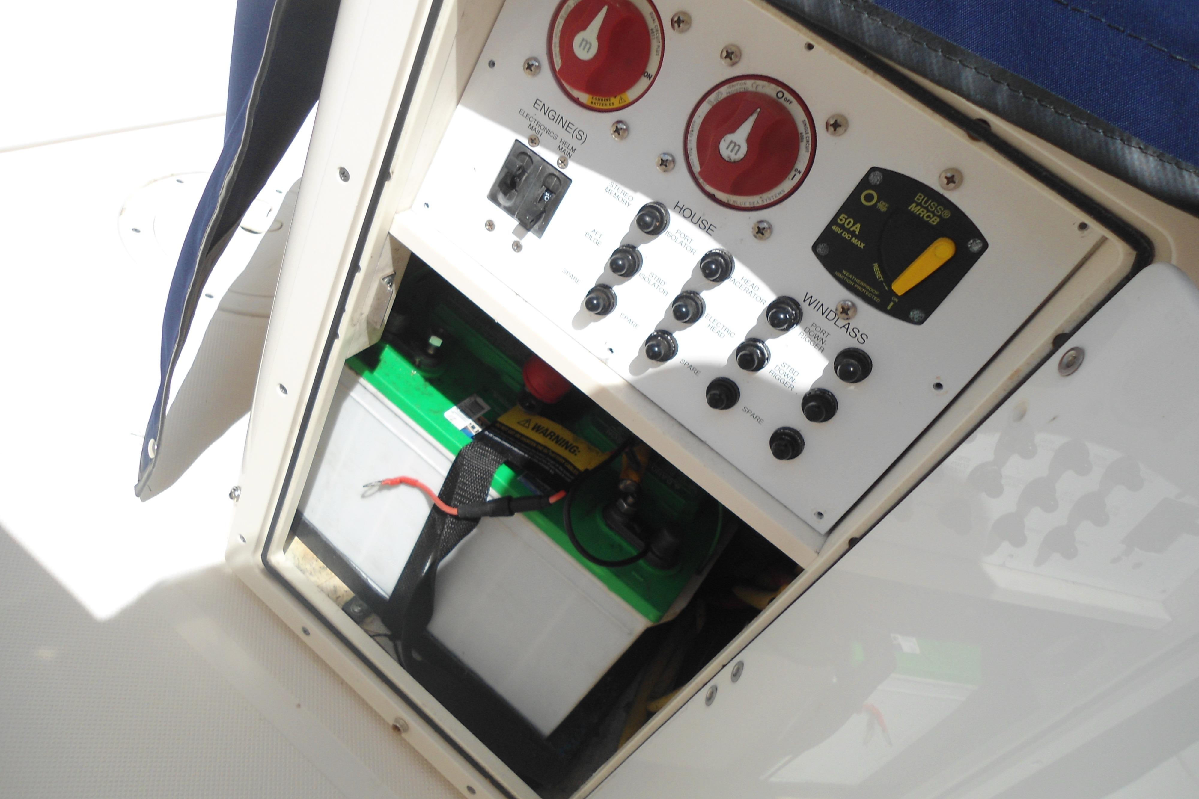 Electrical panel and battery compartment on a 2013 Pursuit C 260 Center Console boat.