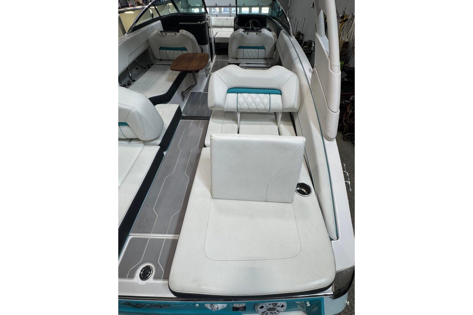 2022 Regal LS6 Surf boat interior with white seating and modern design.