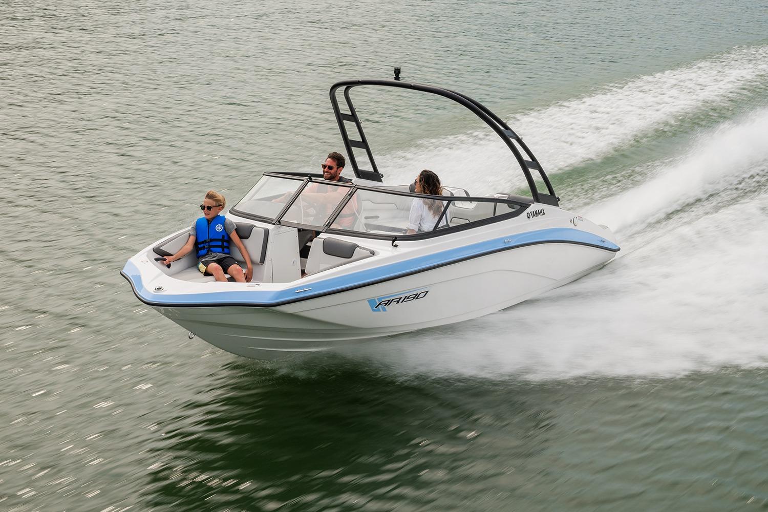 Manufacturer Provided Image: 2026 Yamaha Boats AR190 speeding on water with passengers enjoying the ride.