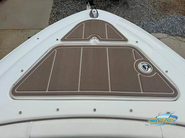 Bow of 2008 Sea Ray 270 SLX boat with tan deck padding.
