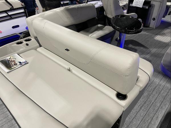 2022 Starcraft SLS-3Q DH boat interior with beige seating and cup holders.