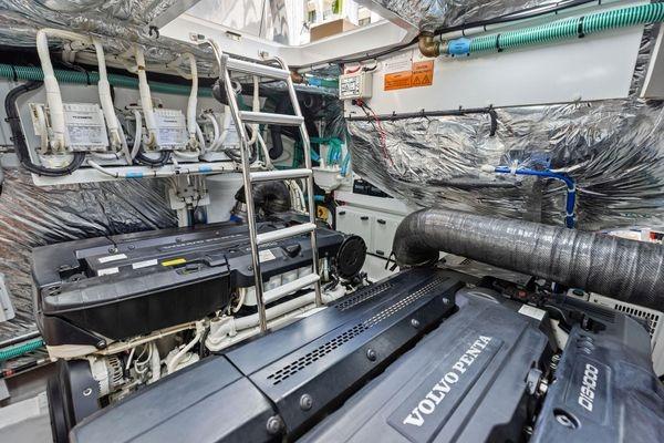 Engine room of 2020 Princess V55 yacht with Volvo Penta engines and advanced equipment.