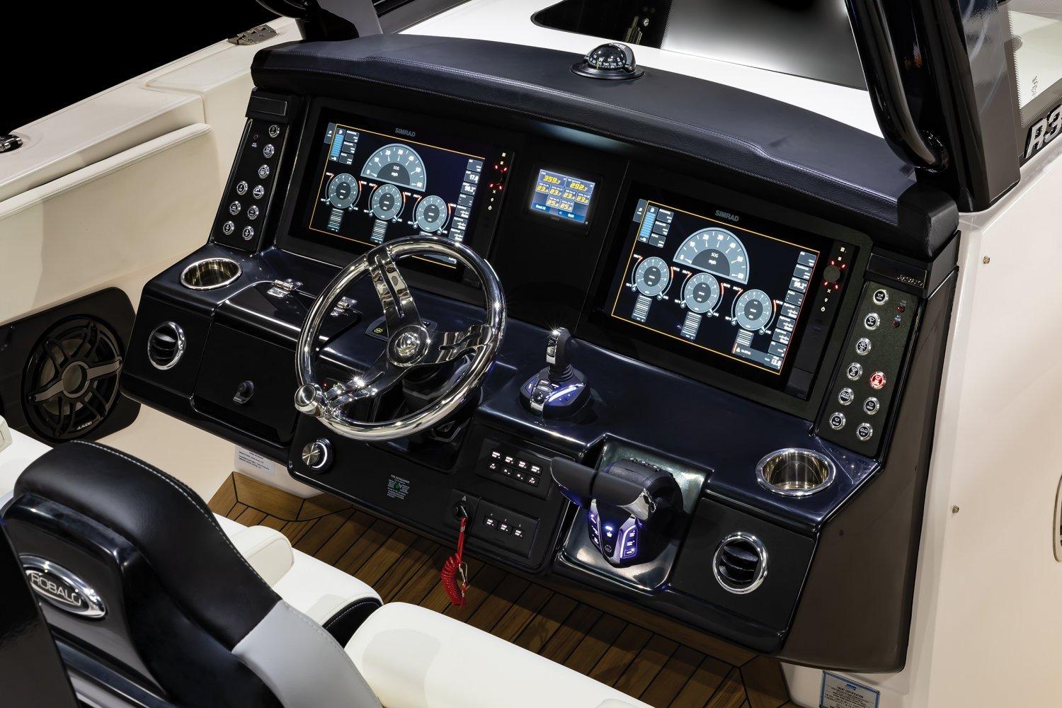 Manufacturer Provided Image: 2026 Robalo R360 Center Console dashboard with advanced navigation displays and controls.