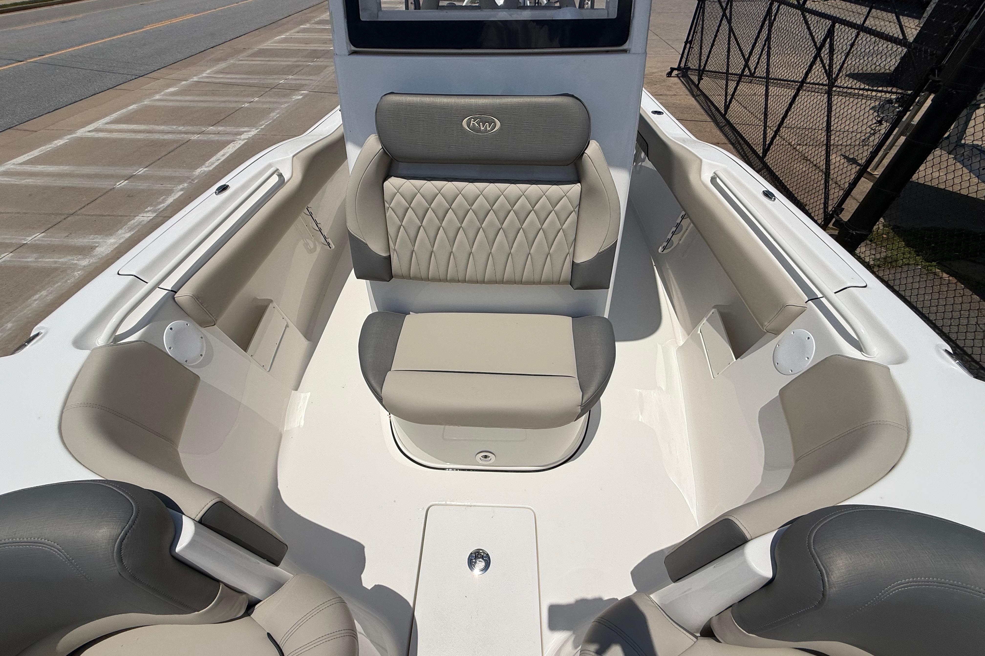 2027 Key West 249 FS boat interior with cushioned seating and modern design.