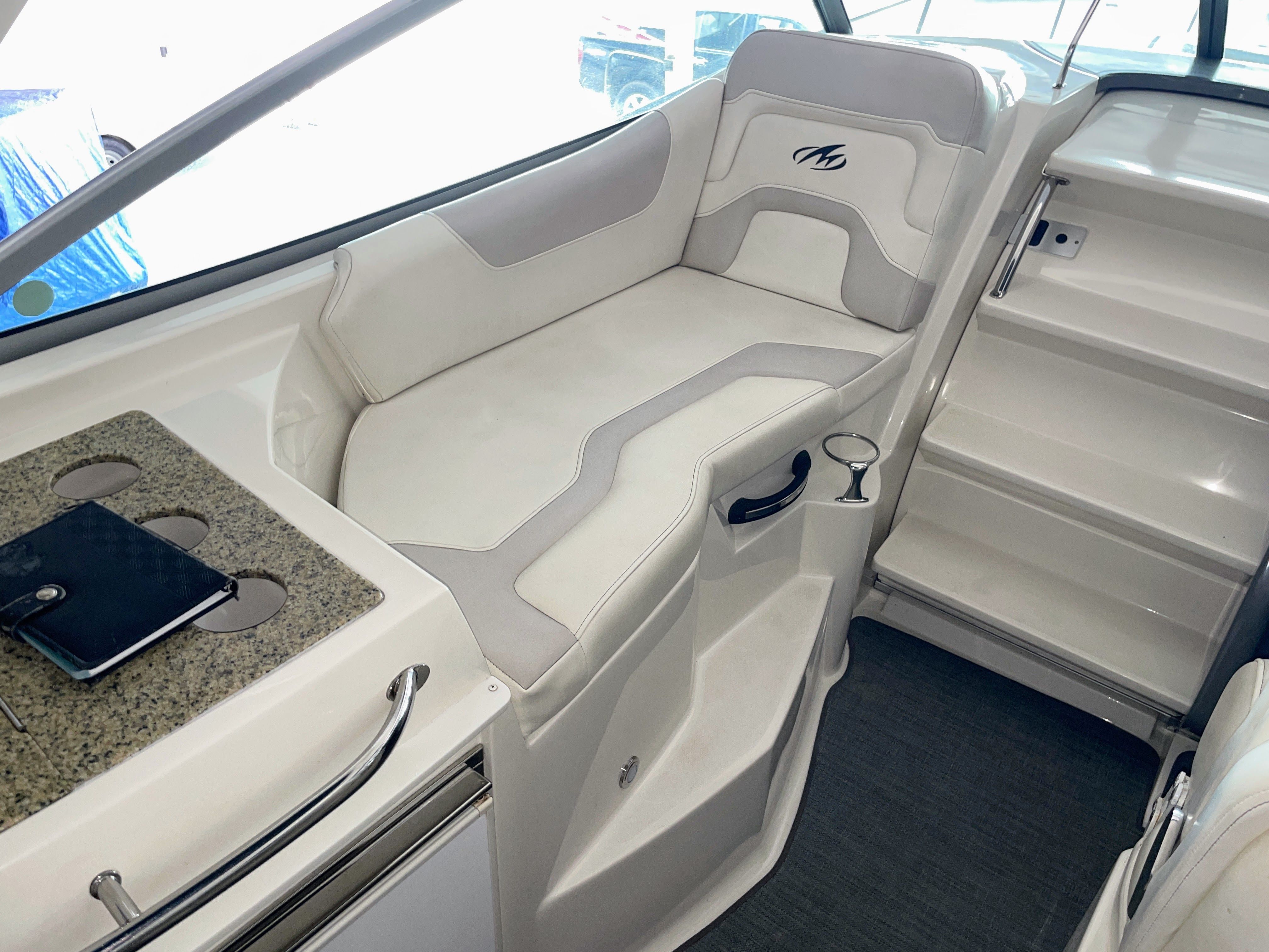 Interior of a 2010 Monterey 280 Sport Cruiser boat.