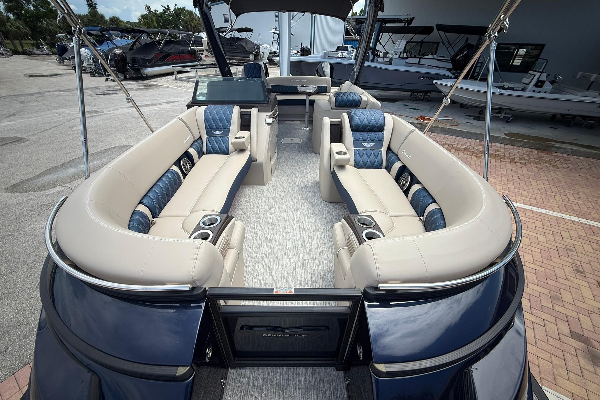 Luxurious 2026 Bennington 27 QSBAT2 pontoon boat with plush seating and modern design.