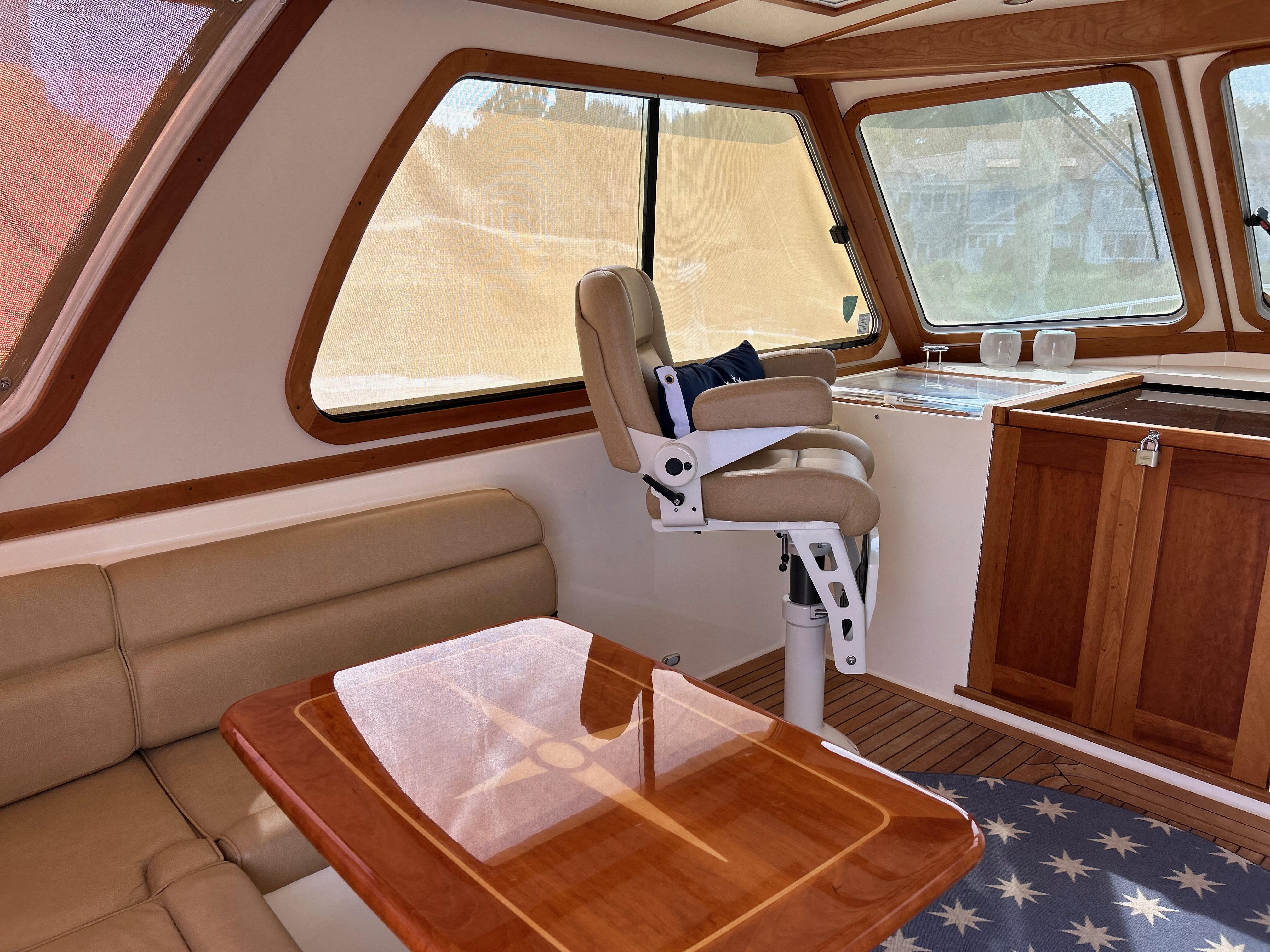 Interior of 2009 Sabre Hardtop Express with leather seating and wooden accents.