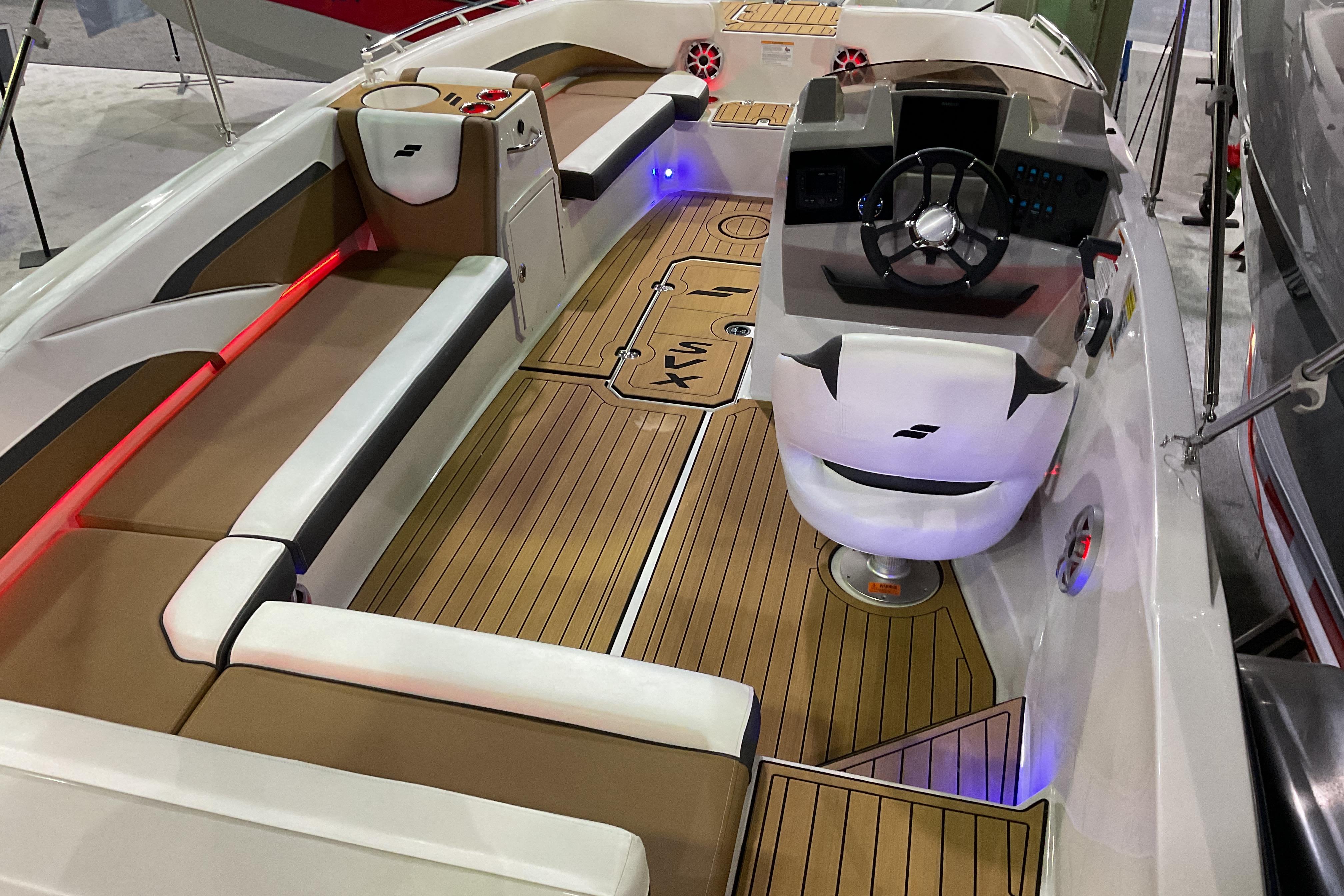 2026 Starcraft SVX 211 OB boat interior with modern seating and sleek dashboard design.