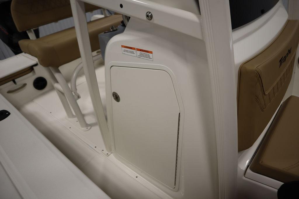 2026 Bayliner Trophy T20CC interior with seating and storage compartment.