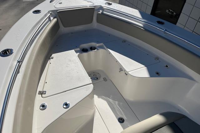 2026 Key West 239 FS boat interior with seating and storage compartments.
