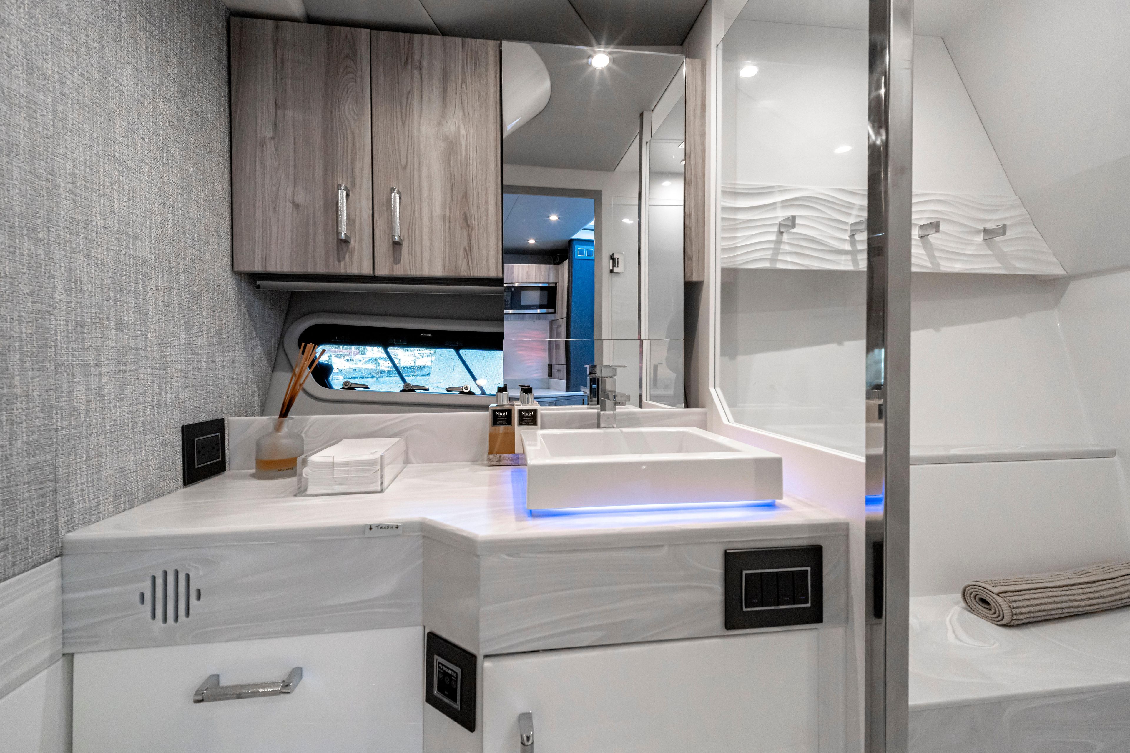 Luxurious bathroom interior of 2022 Formula 500 Super Sport Crossover yacht.