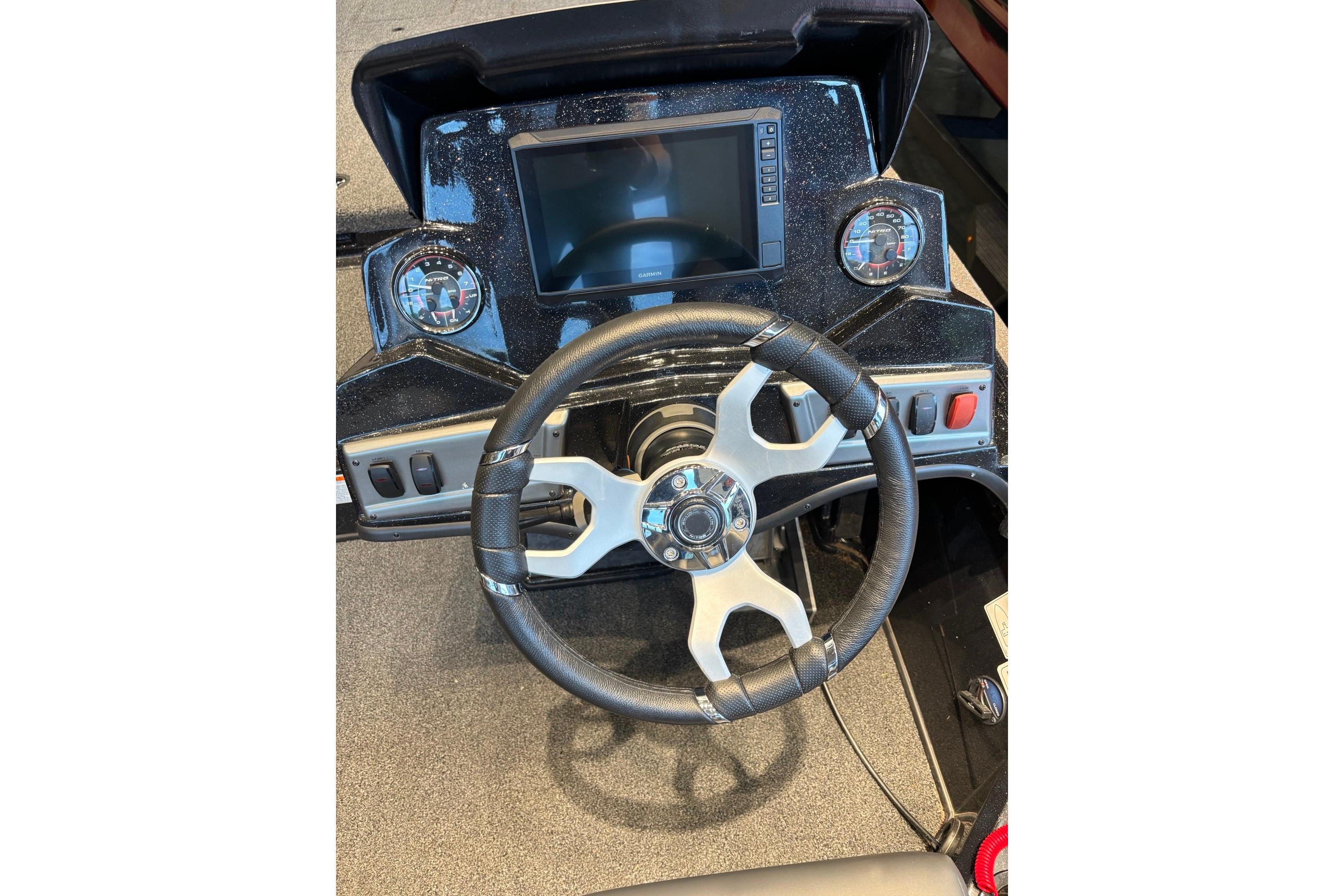 Steering wheel and dashboard of 2026 Nitro Z19 XL Pro boat.