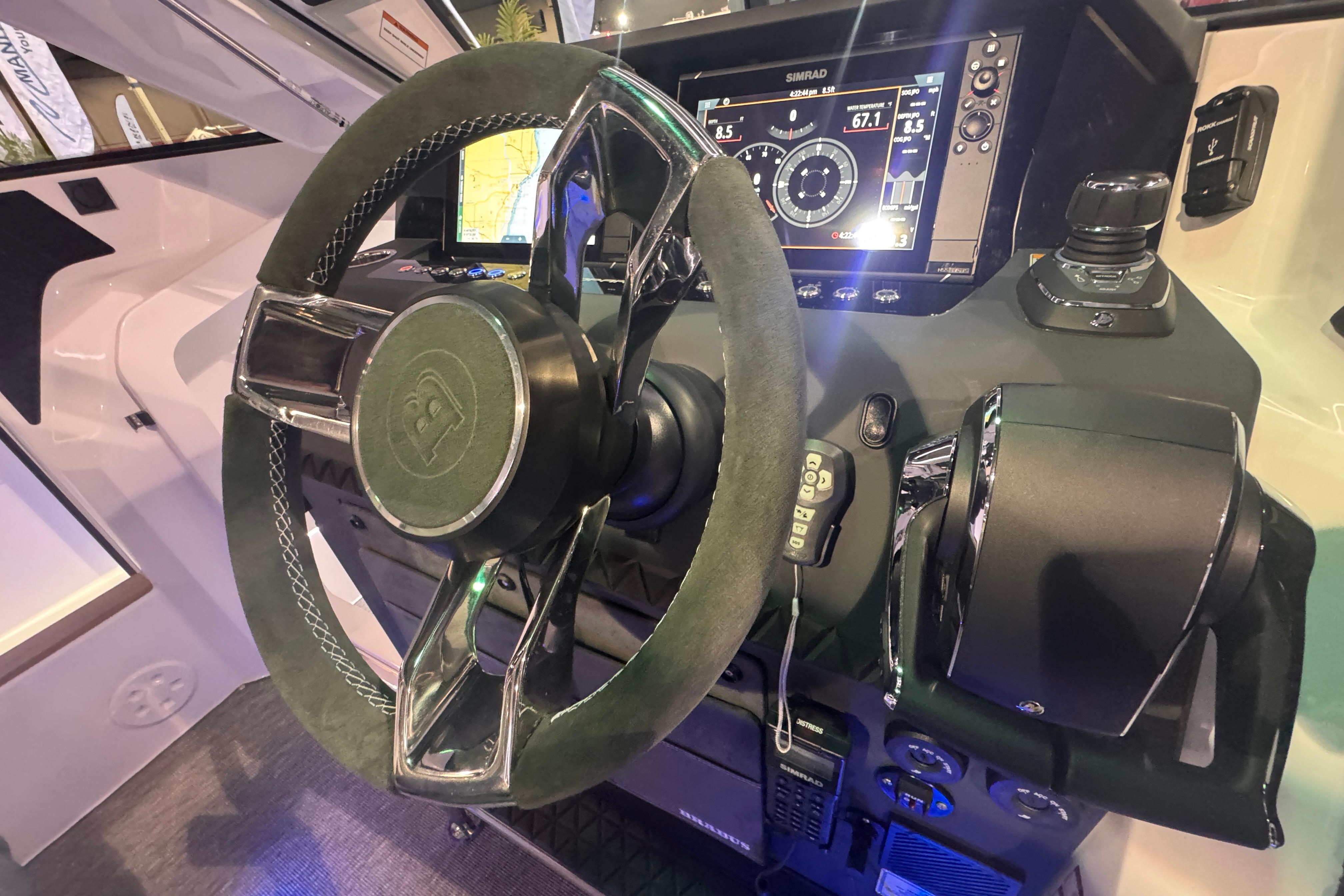 2025 Axopar 37 XC Cross Cabin helm with advanced navigation display and controls.