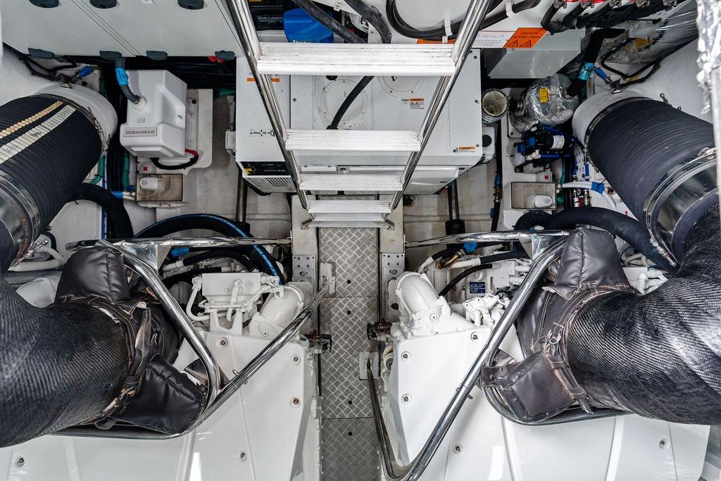 Engine room of a 2020 Princess S62 yacht, showcasing machinery and equipment.