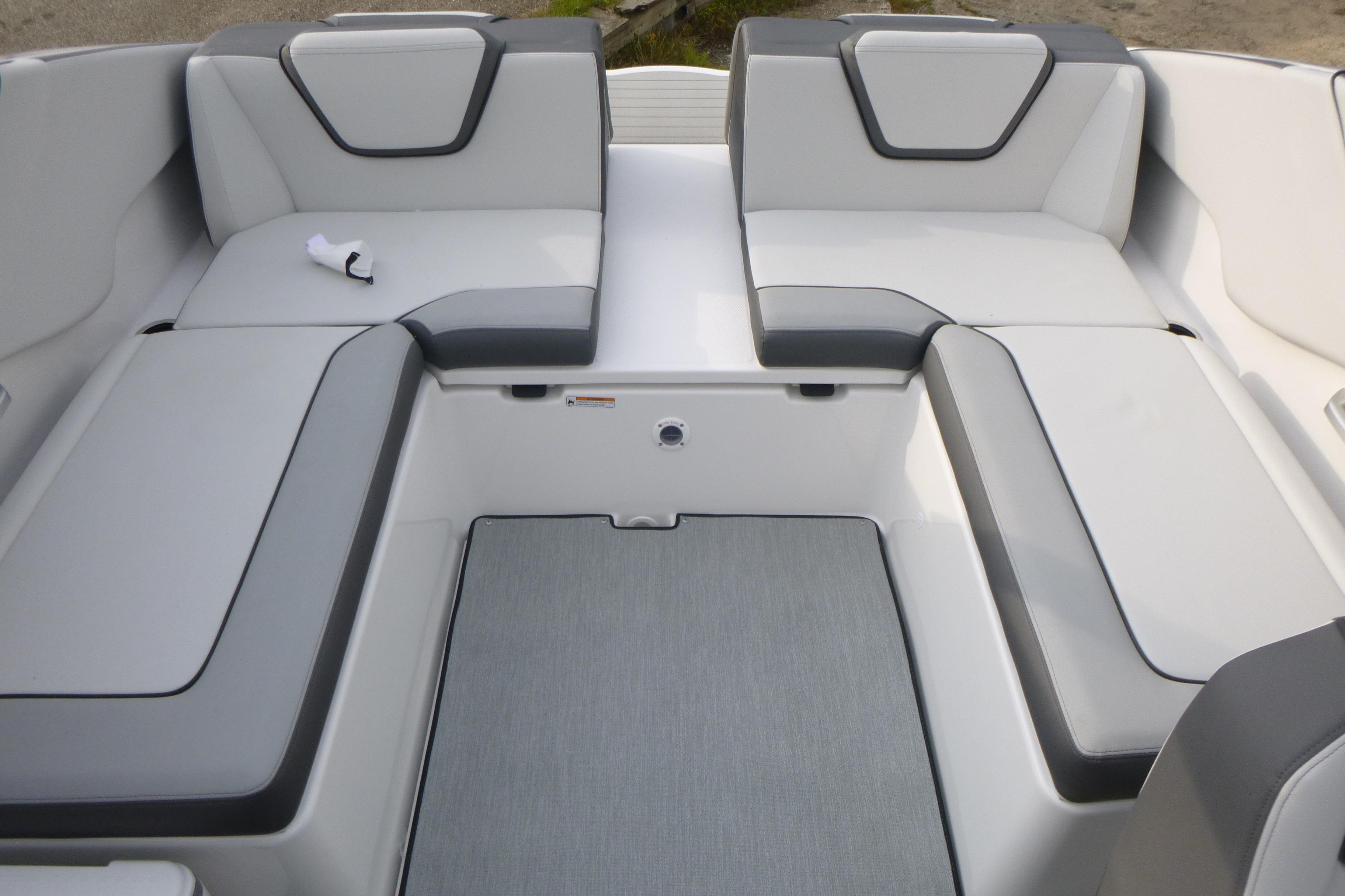 2026 Yamaha Boats AR250 interior seating with gray and white upholstery.