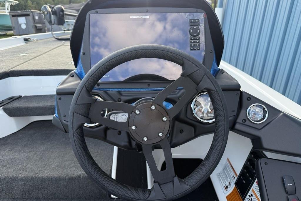 Steering wheel and dashboard of 2026 Skeeter ZXR19 SE boat with digital display.